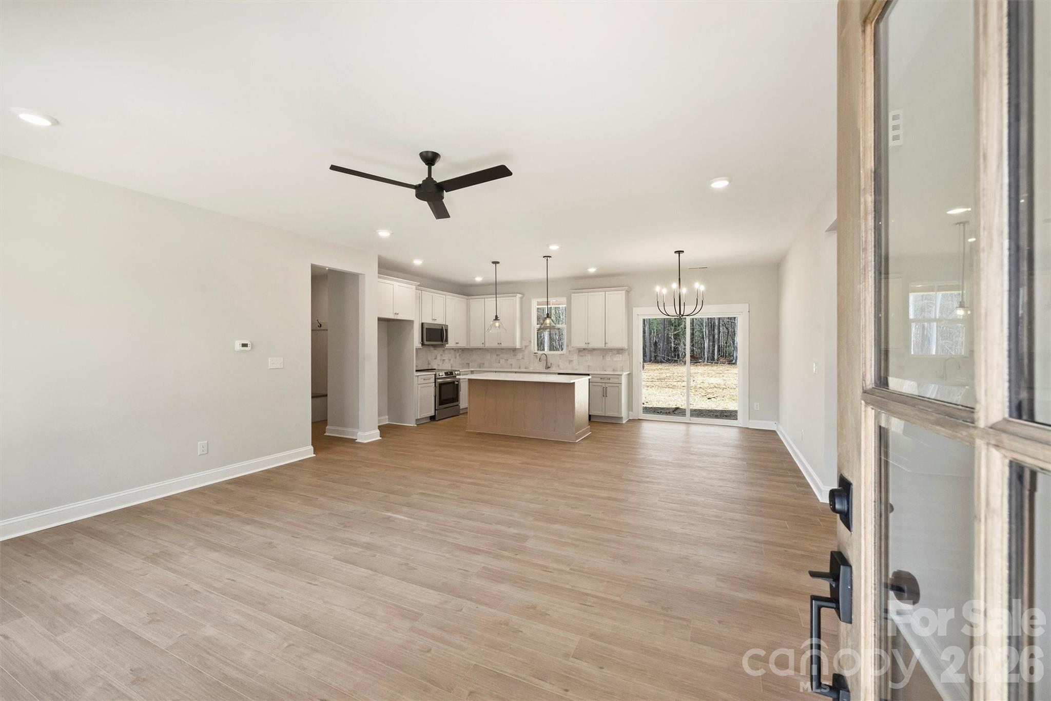 2279 Lee Lawing Road Lincolnton, NC 28092 - Photo 4 of 41 a view of a kitchen with a sink and a refrigerator