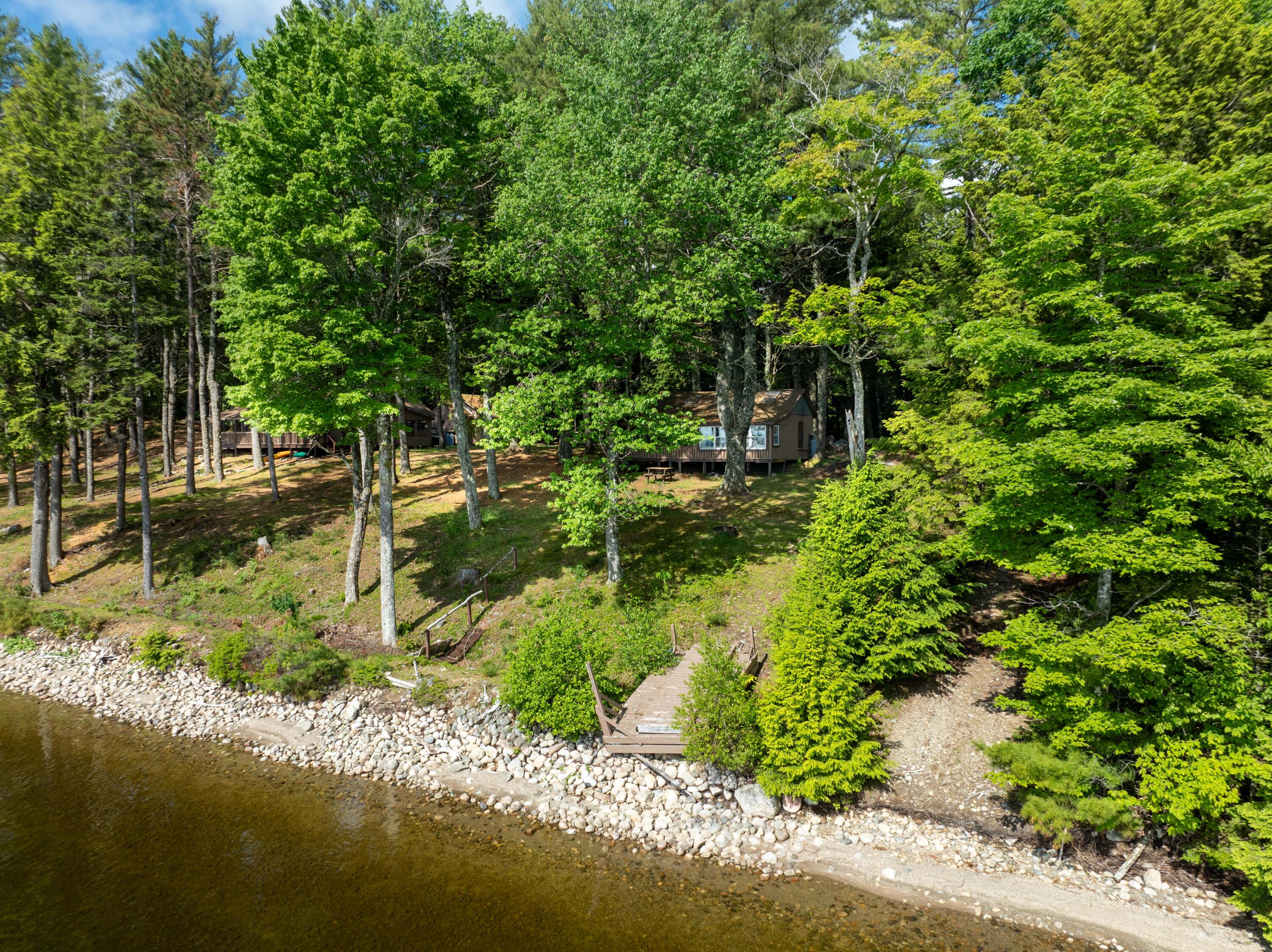 0 Junior Bay Road Princeton, ME 04668 - Photo 7 of 110 Shoreline of camps...