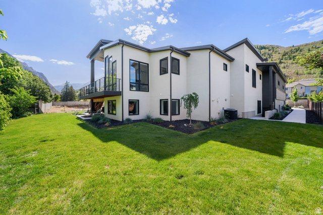3667 Little Cottonwood Road, Unit 1 Sandy, UT 84092 - Photo 6 of 49 Modern architecture featuring a light-colored exterior with black-framed windows