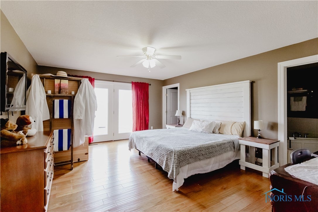 3b County Road West Liberty Center, OH 43532 - Photo 26 of 49 Primary Bedroom with walk-in closet and sauna!