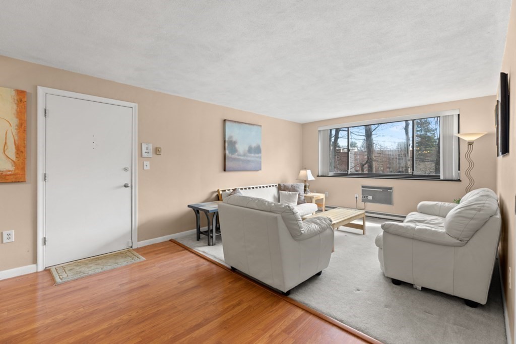 1323 Worcester Road, Unit H6 Framingham, MA 01701 - Photo 5 of 23 a living room with furniture and a large window