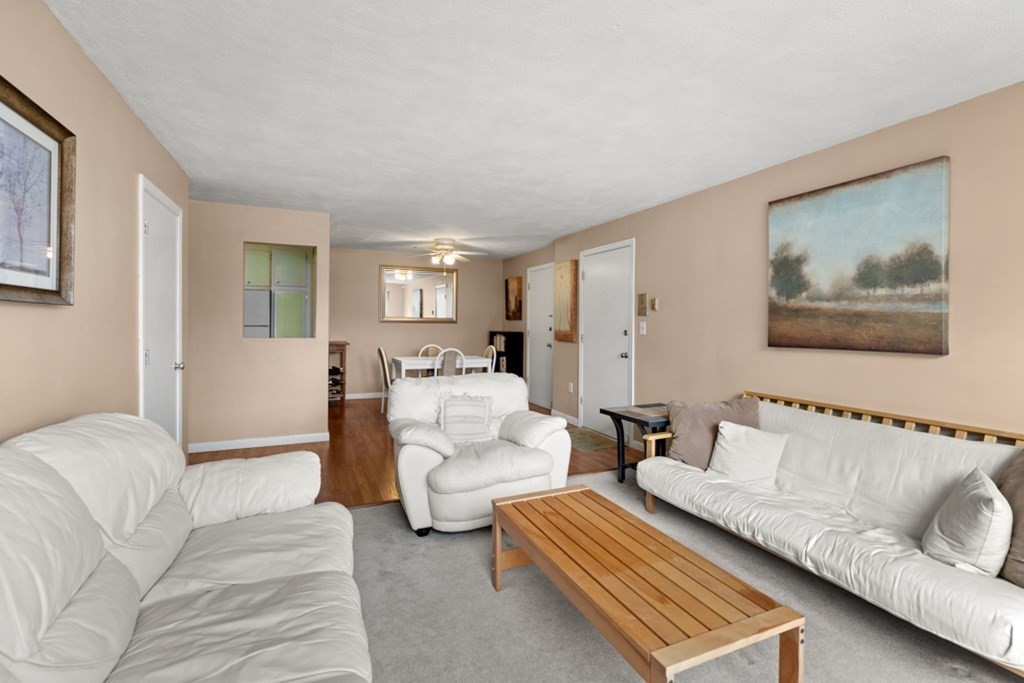 1323 Worcester Road, Unit H6 Framingham, MA 01701 - Photo 6 of 23 a living room with furniture and a couch
