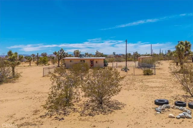 a view of a beach with a yard