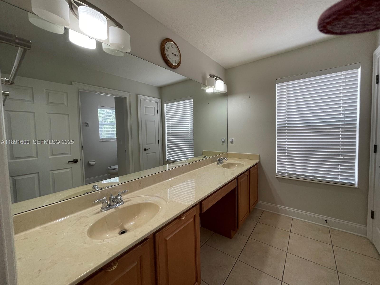 6841 Dolce Way Orlando, FL 32819 - Photo 33 of 38 2nd full bath