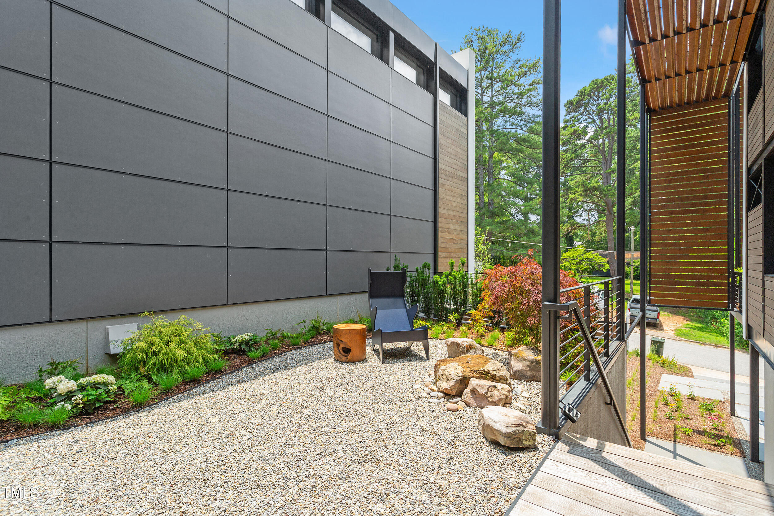 922 Tower Street Raleigh, NC 27607 - Photo 4 of 48 a view of a backyard with sitting area