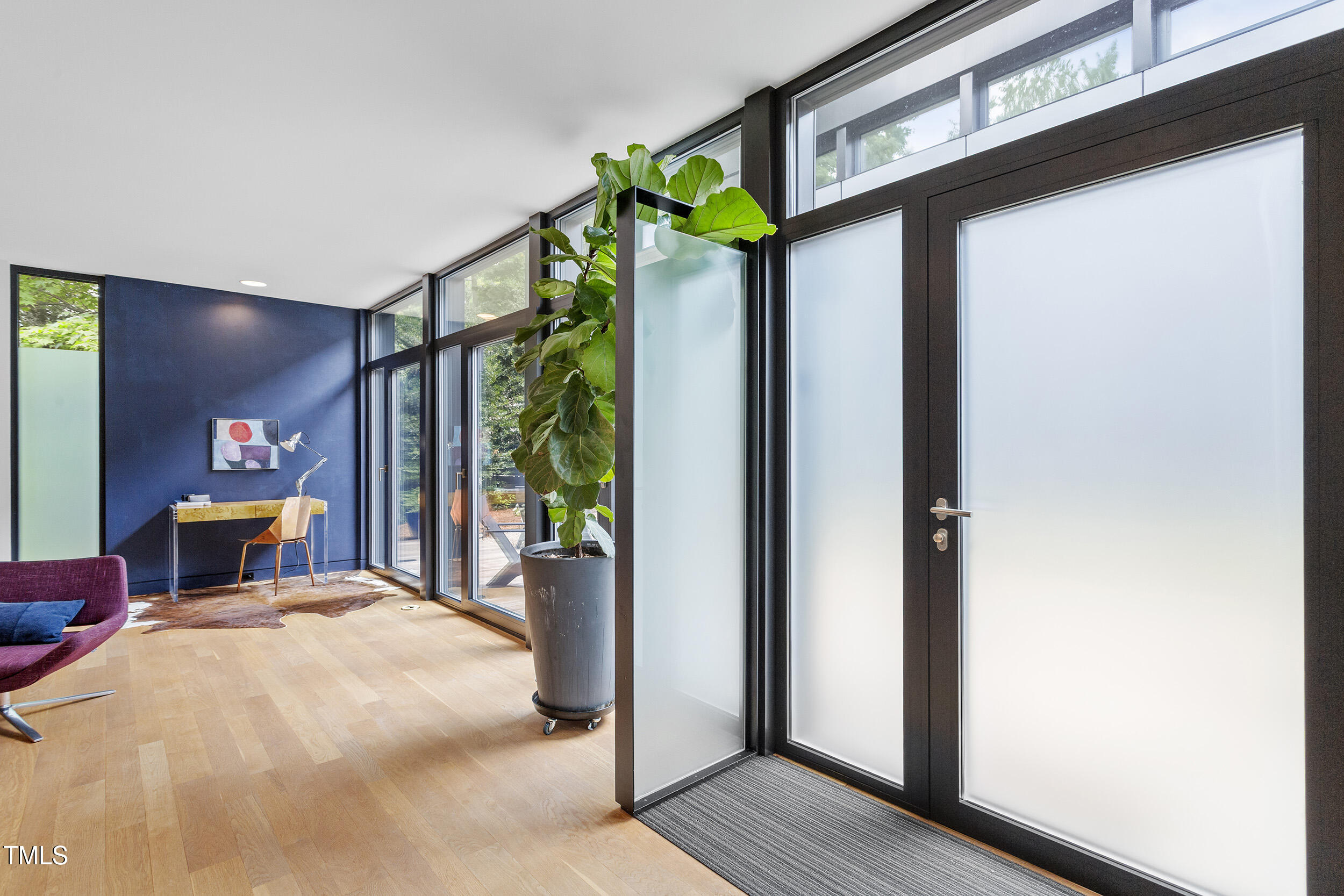 922 Tower Street Raleigh, NC 27607 - Photo 7 of 48 a bedroom with a bed and a window