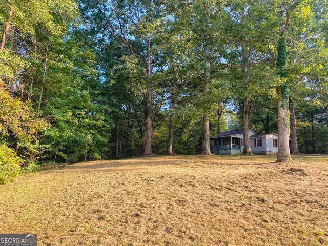 a house with trees in front of it