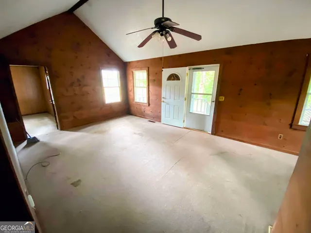 a view of a livingroom with a staircase