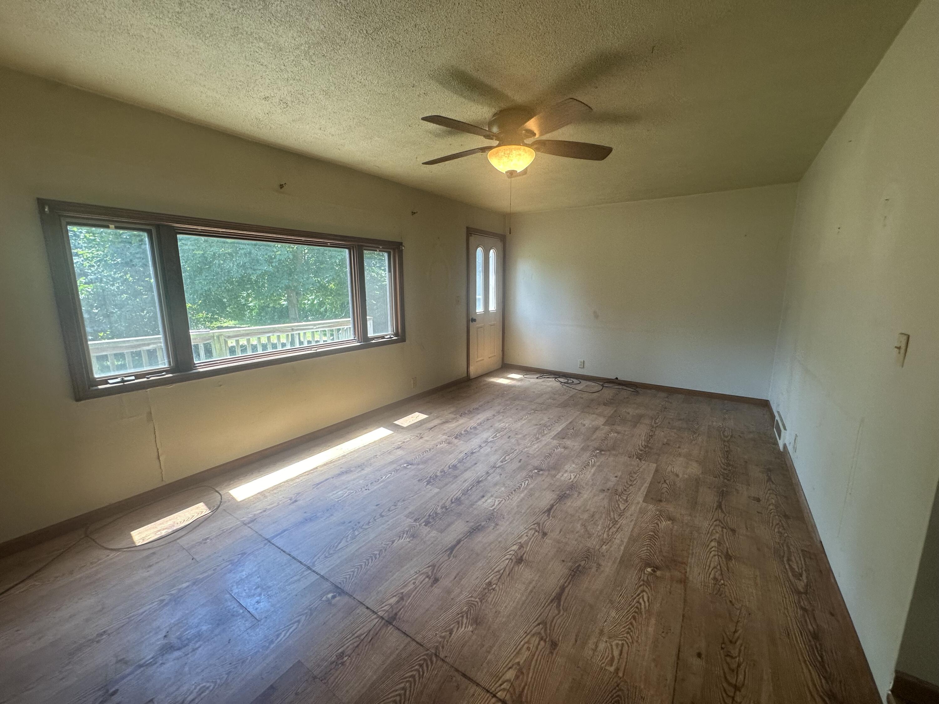 14980 Hall Road Ravenna, MI 49451 - Photo 10 of 22 front living room 2