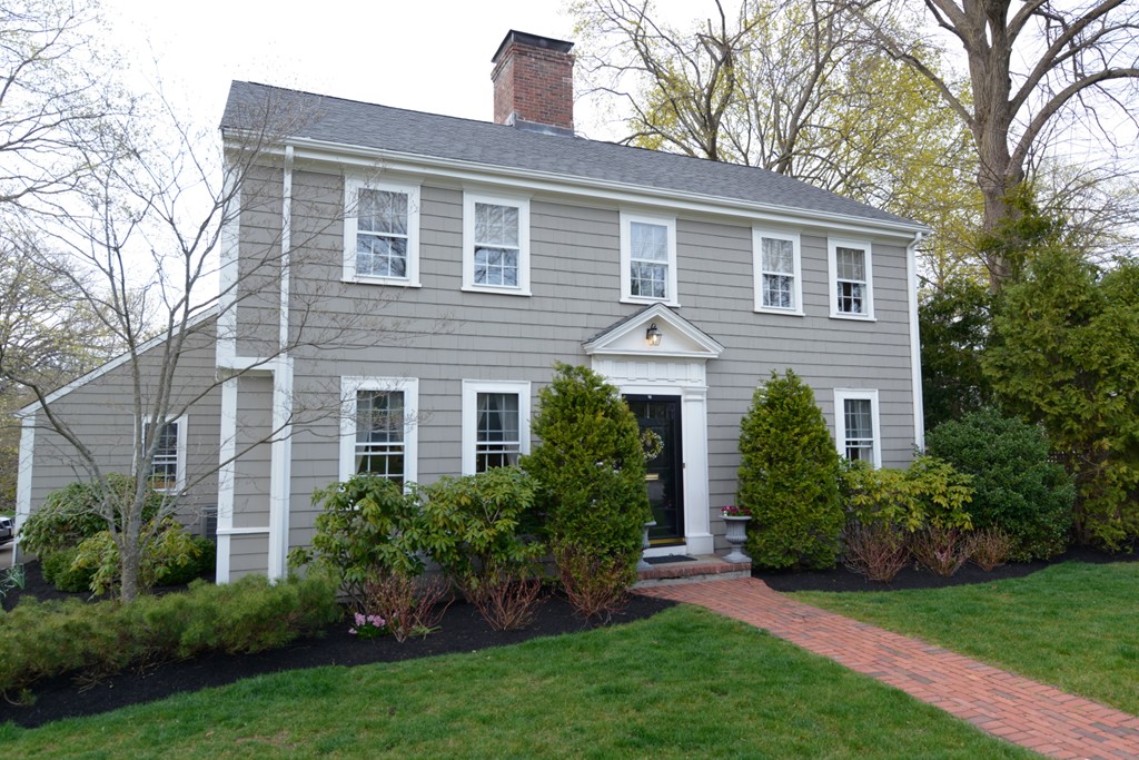 5 Ingraham Road Wellesley, MA 02482 - Photo 1 of 11 a front view of a house with a garden