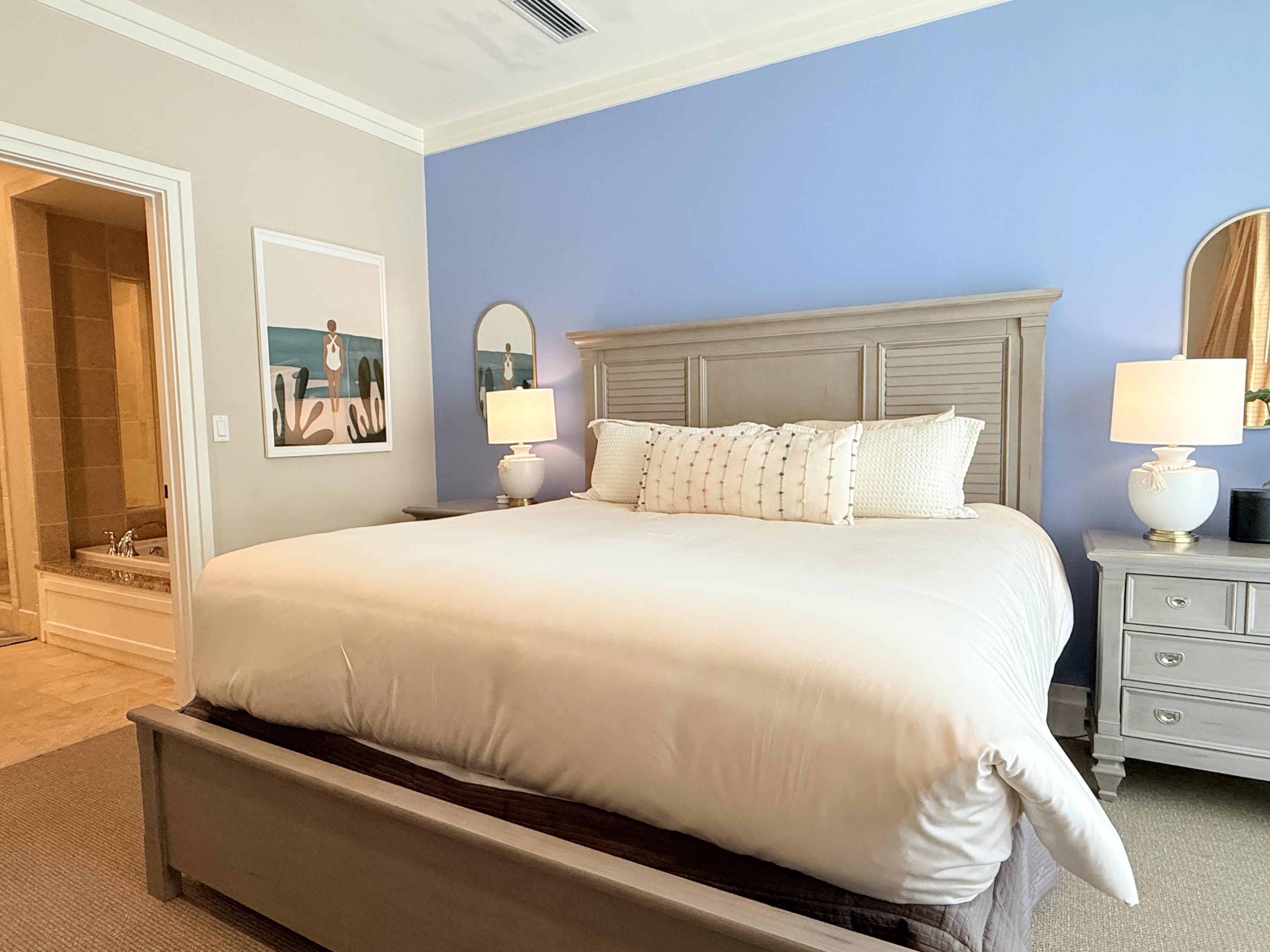 32461 East County Highway 30A, Unit 104 Inlet Beach, FL 32461 - Photo 24 of 97 a bedroom with a bed and a night stand