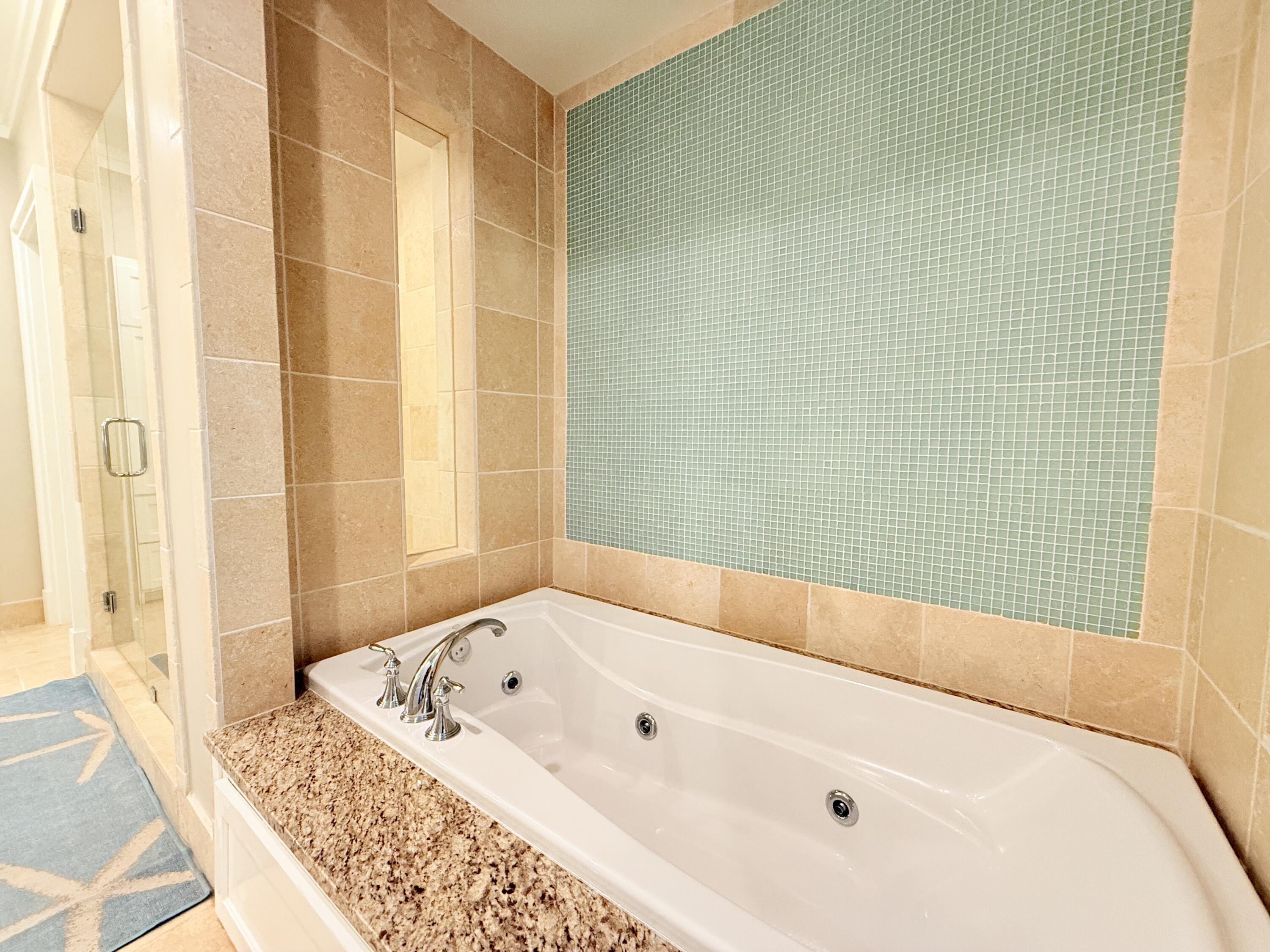 32461 East County Highway 30A, Unit 104 Inlet Beach, FL 32461 - Photo 31 of 97 a bathroom with a bathtub and shower