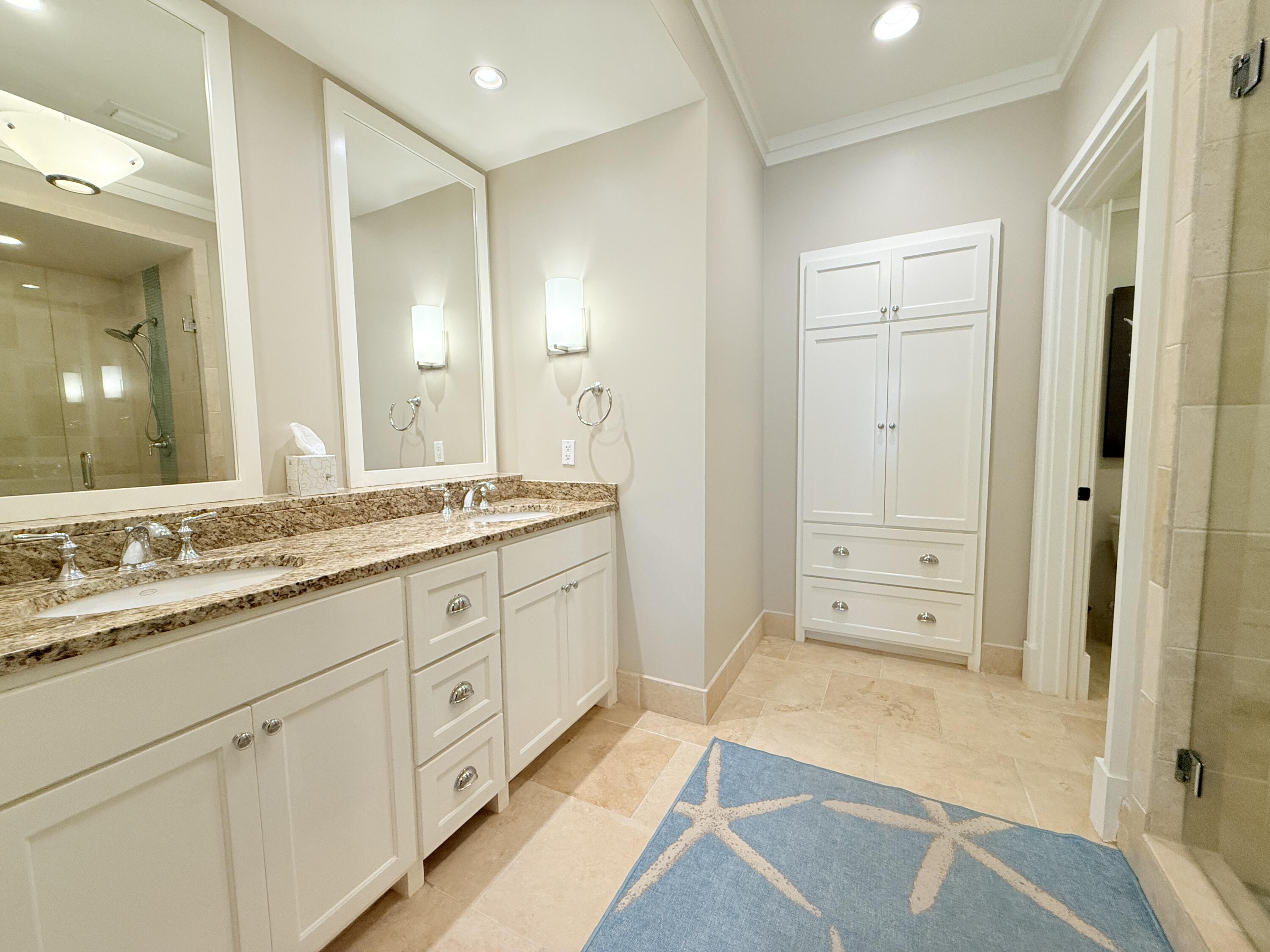 32461 East County Highway 30A, Unit 104 Inlet Beach, FL 32461 - Photo 32 of 97 a spacious bathroom with a granite countertop sink mirror and