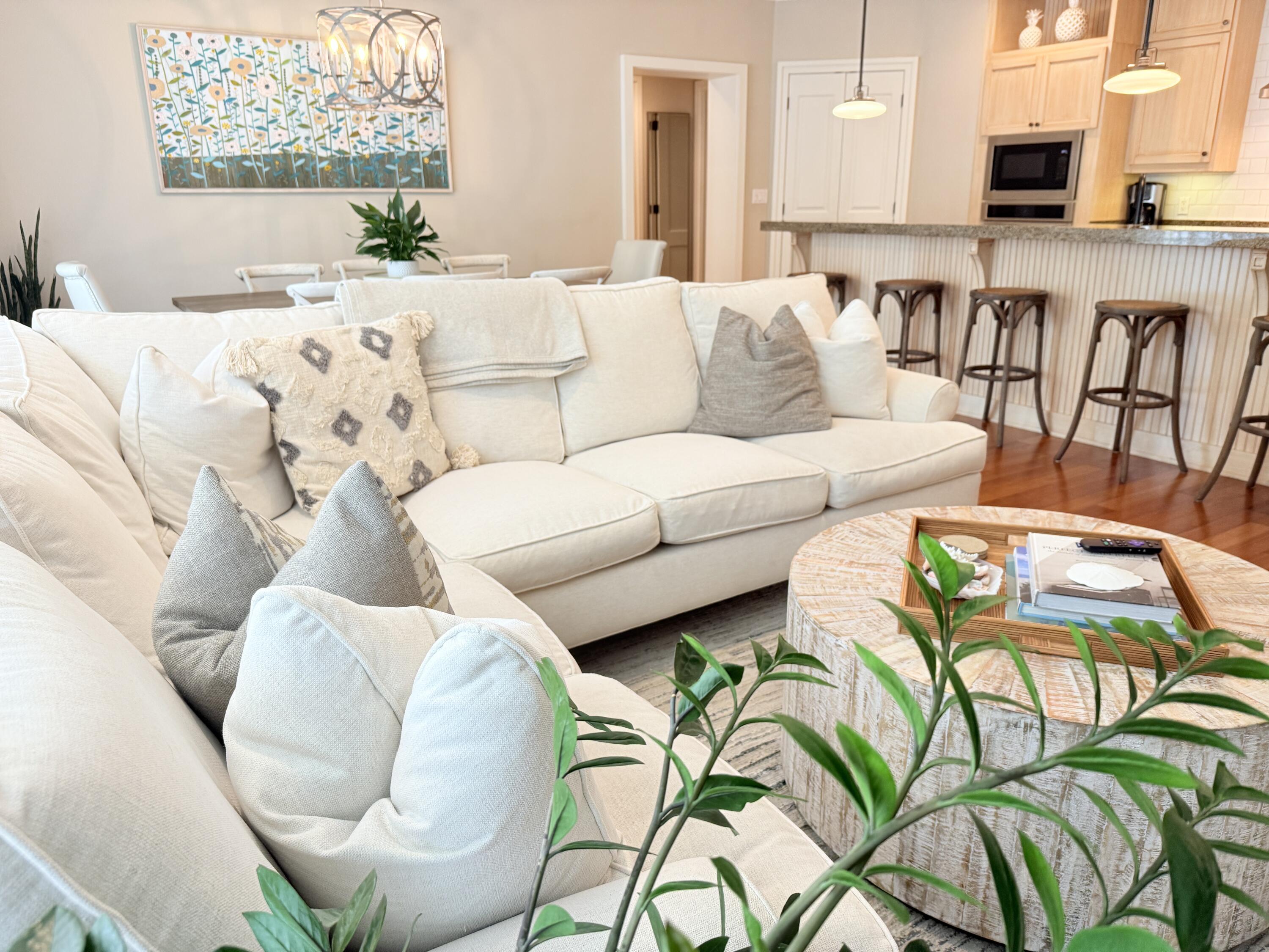 32461 East County Highway 30A, Unit 104 Inlet Beach, FL 32461 - Photo 39 of 97 a living room with furniture and painting on the wall