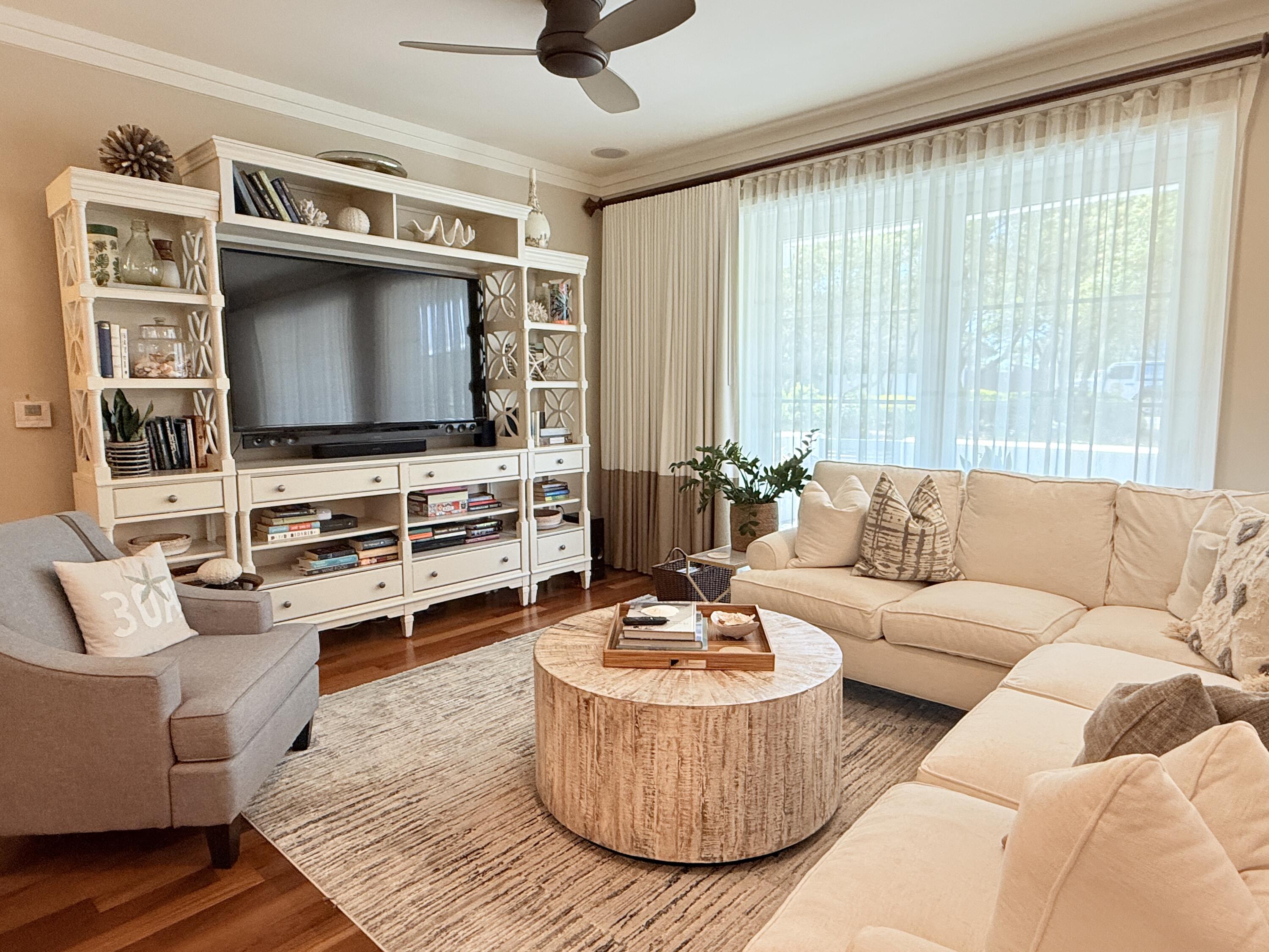 32461 East County Highway 30A, Unit 104 Inlet Beach, FL 32461 - Photo 5 of 97 a living room with furniture and a flat screen tv
