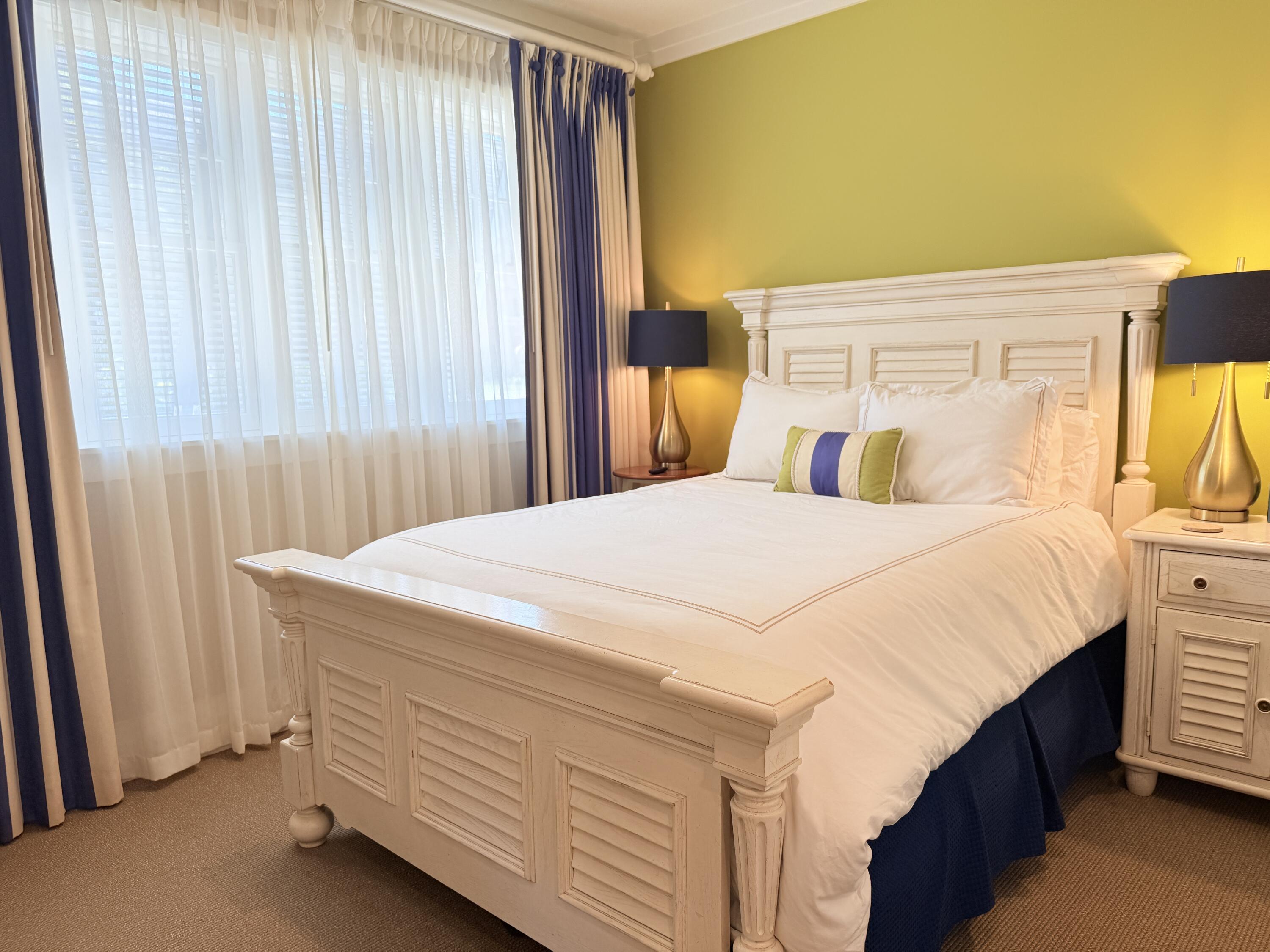 32461 East County Highway 30A, Unit 104 Inlet Beach, FL 32461 - Photo 58 of 97 a bedroom with a bed and a window