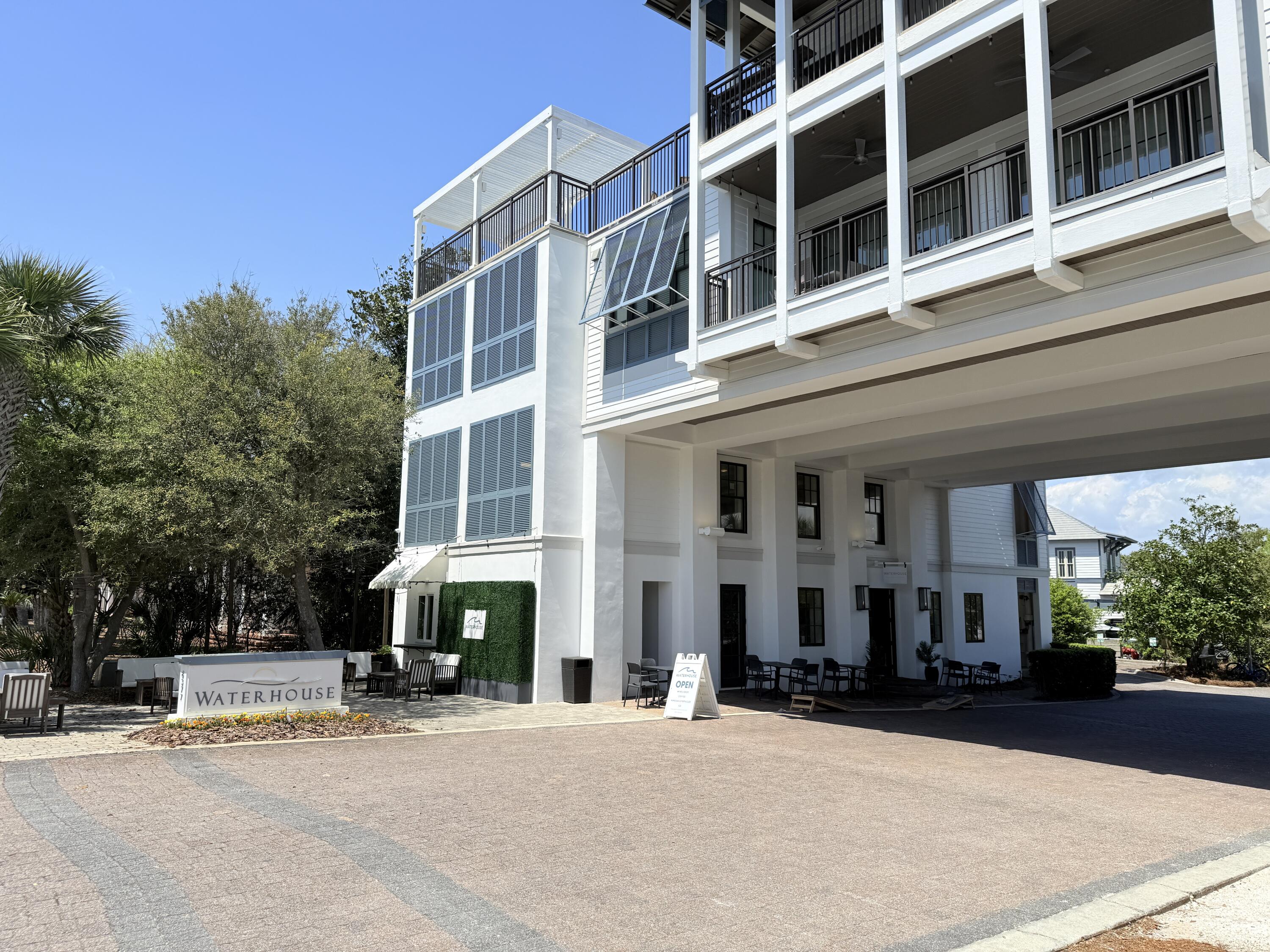 32461 East County Highway 30A, Unit 104 Inlet Beach, FL 32461 - Photo 71 of 97 a front view of a building with street