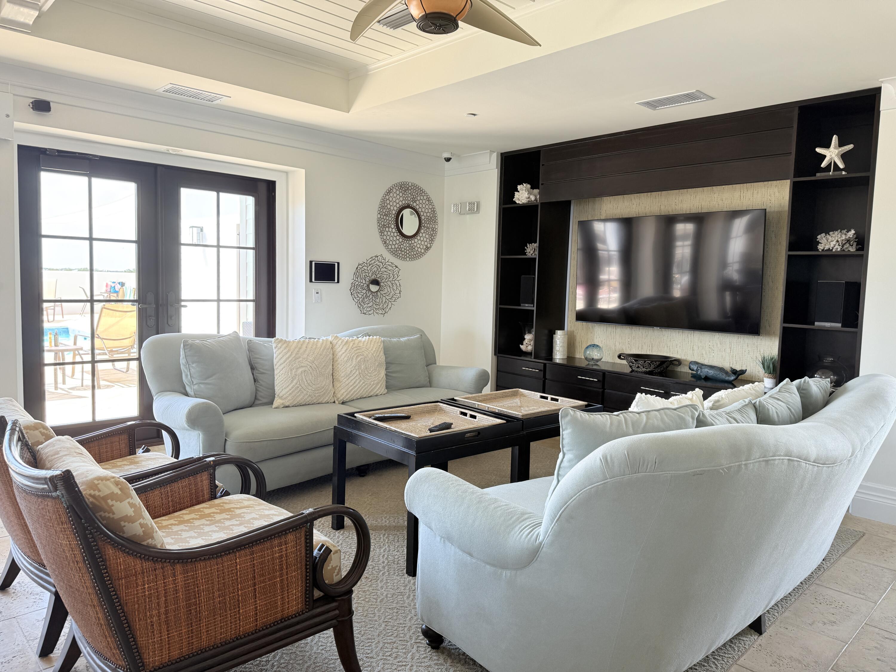 32461 East County Highway 30A, Unit 104 Inlet Beach, FL 32461 - Photo 77 of 97 a living room with furniture and a large window