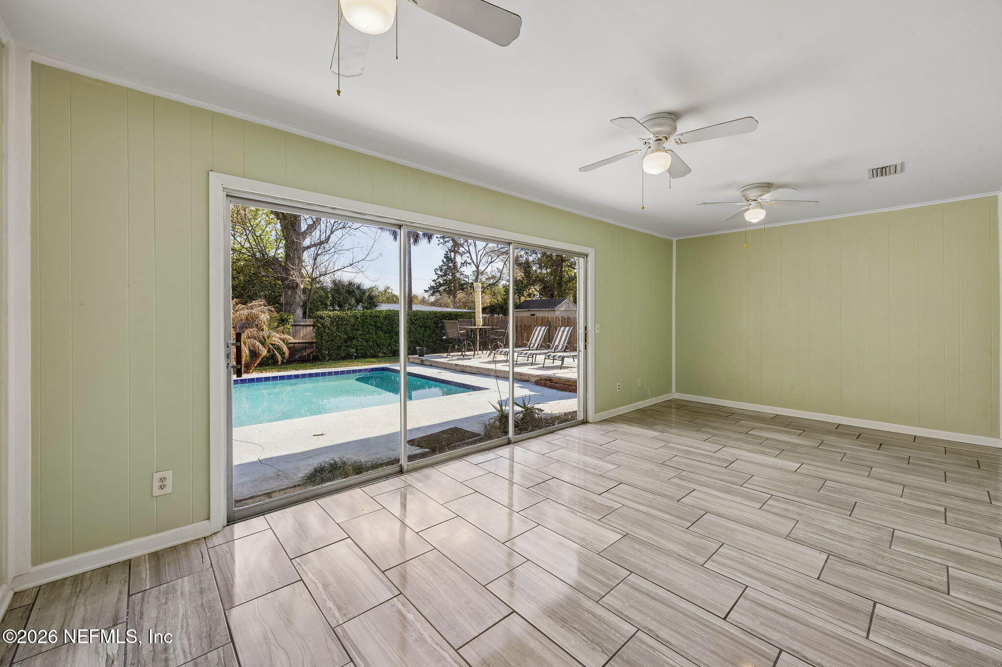 3647 Coronado Road Jacksonville, FL 32217 - Photo 13 of 49 a view of an empty room with a window