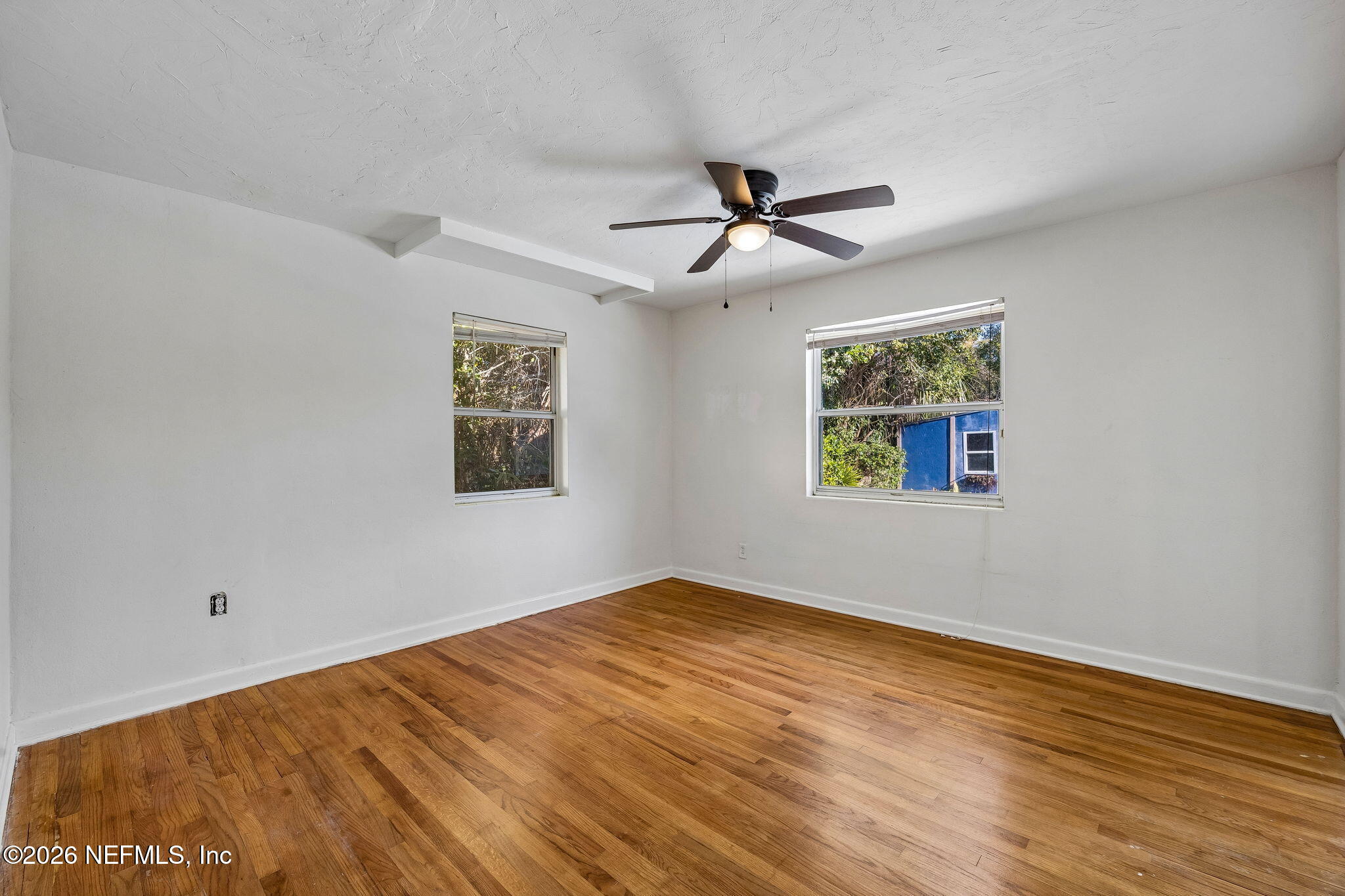 3647 Coronado Road Jacksonville, FL 32217 - Photo 23 of 49 a view of empty room with wooden floor