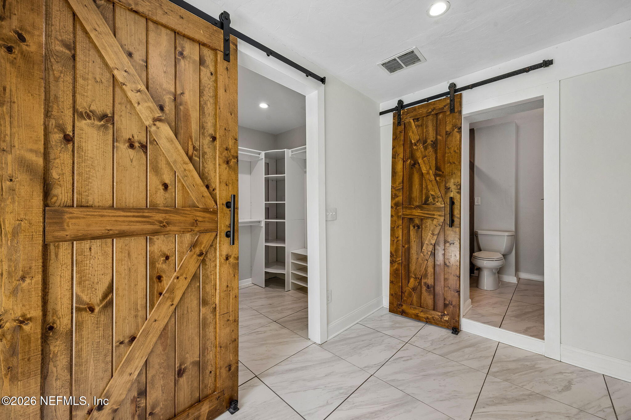 3647 Coronado Road Jacksonville, FL 32217 - Photo 27 of 49 a view of front door with wooden floor