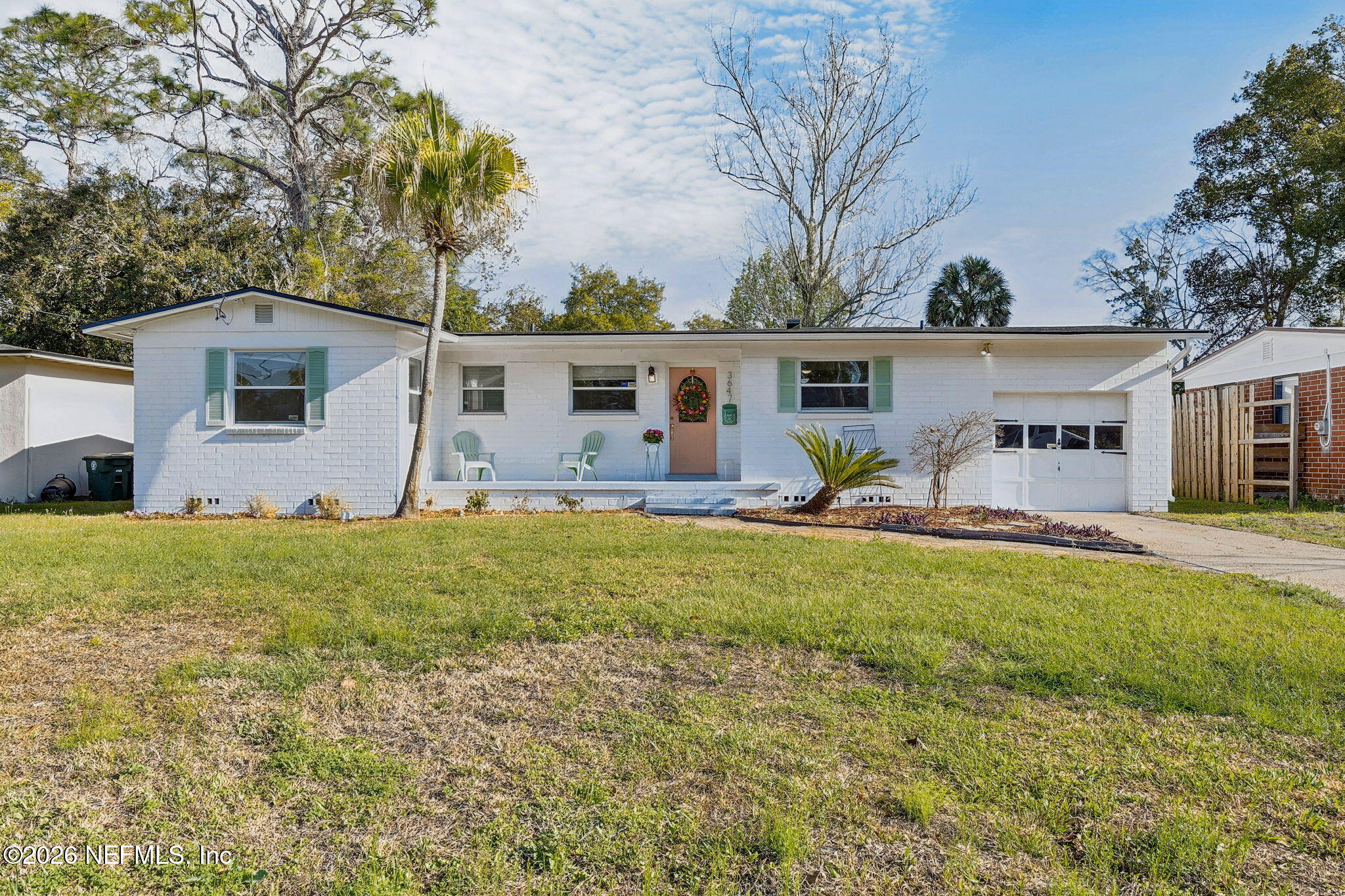 3647 Coronado Road Jacksonville, FL 32217 - Photo 4 of 49 a front view of house with yard and seating area