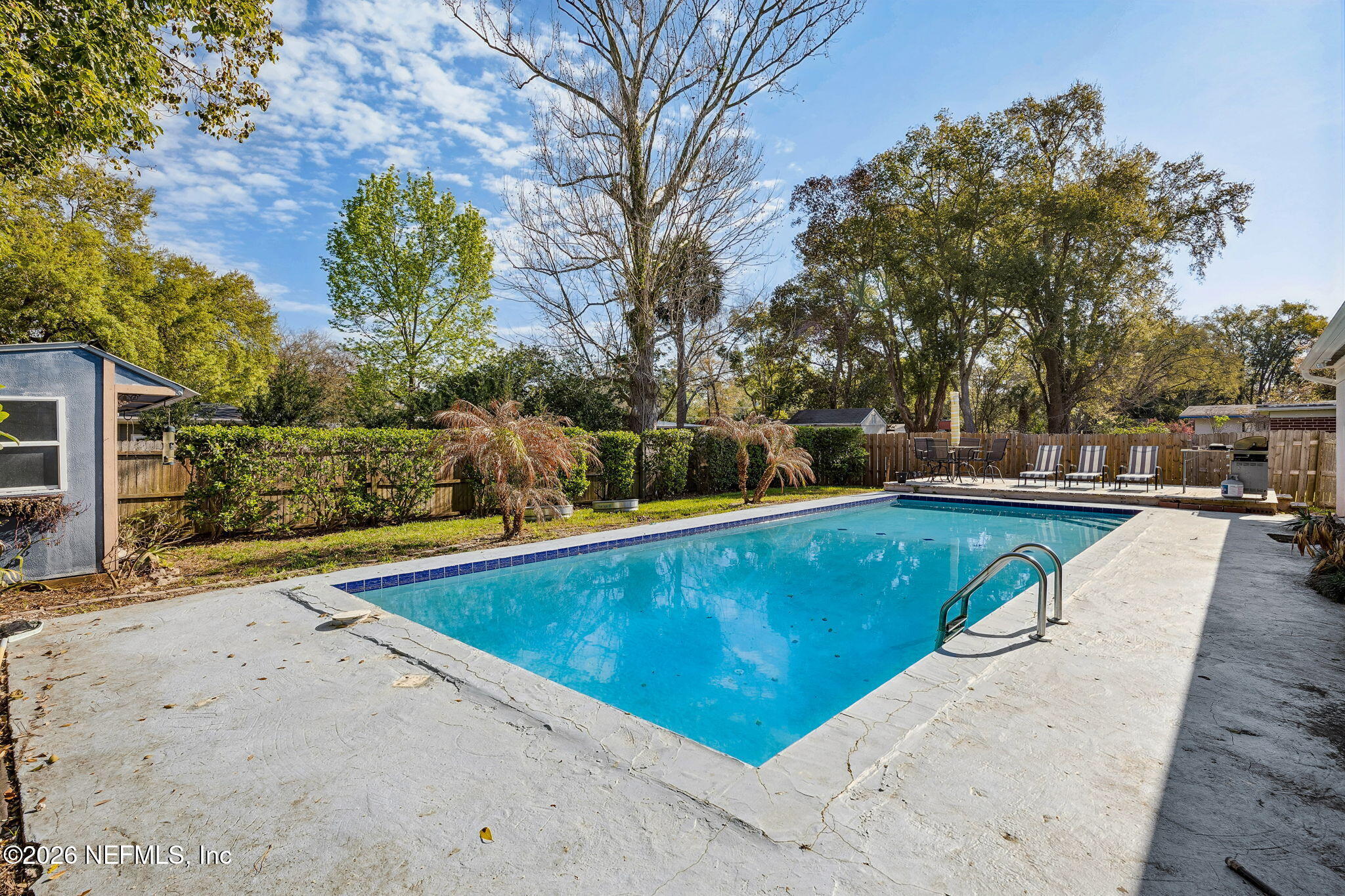 3647 Coronado Road Jacksonville, FL 32217 - Photo 48 of 49 a view of a swimming pool with an outdoor seating