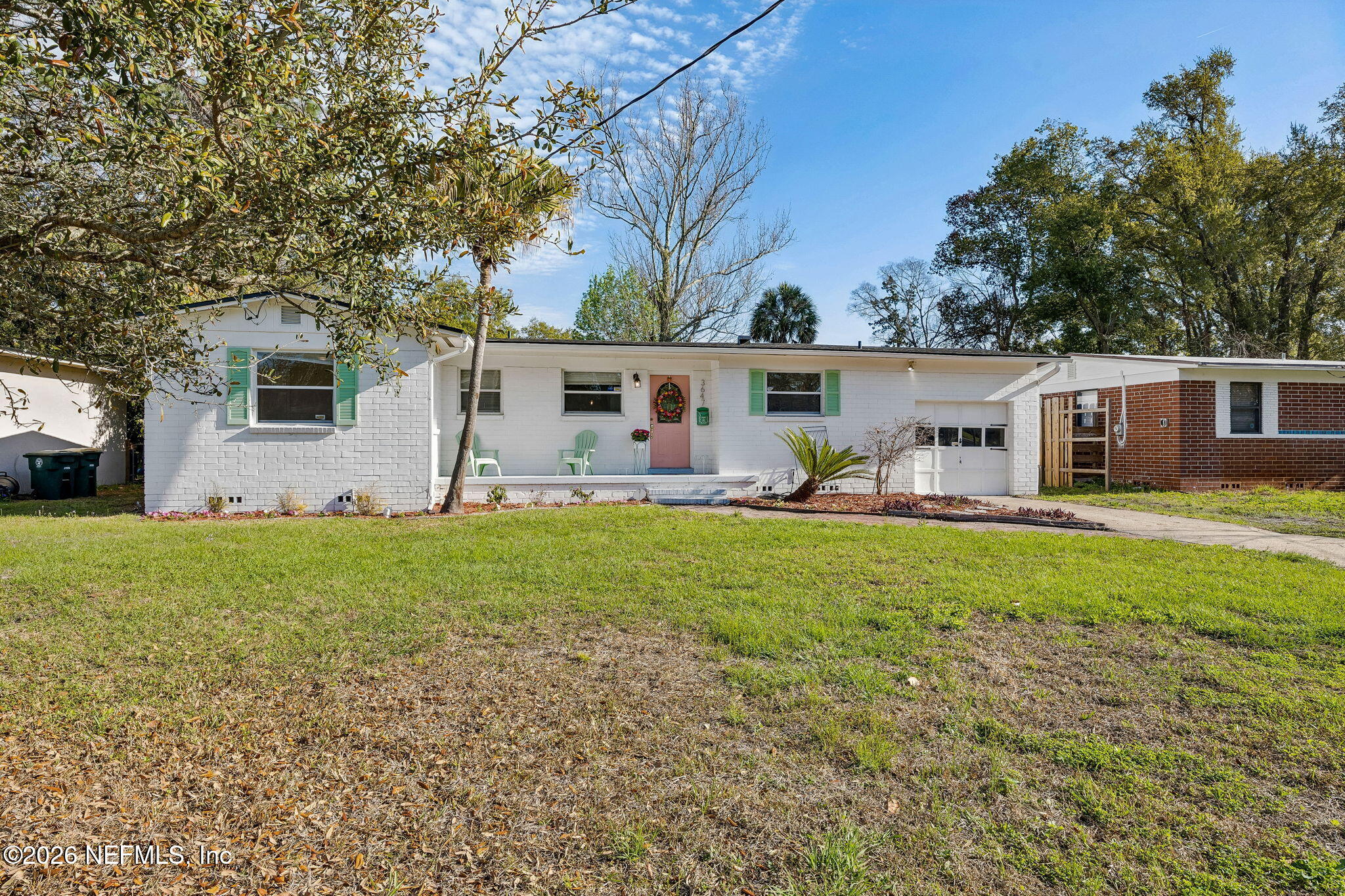 3647 Coronado Road Jacksonville, FL 32217 - Photo 5 of 49 a view of house with backyard and outdoor seating