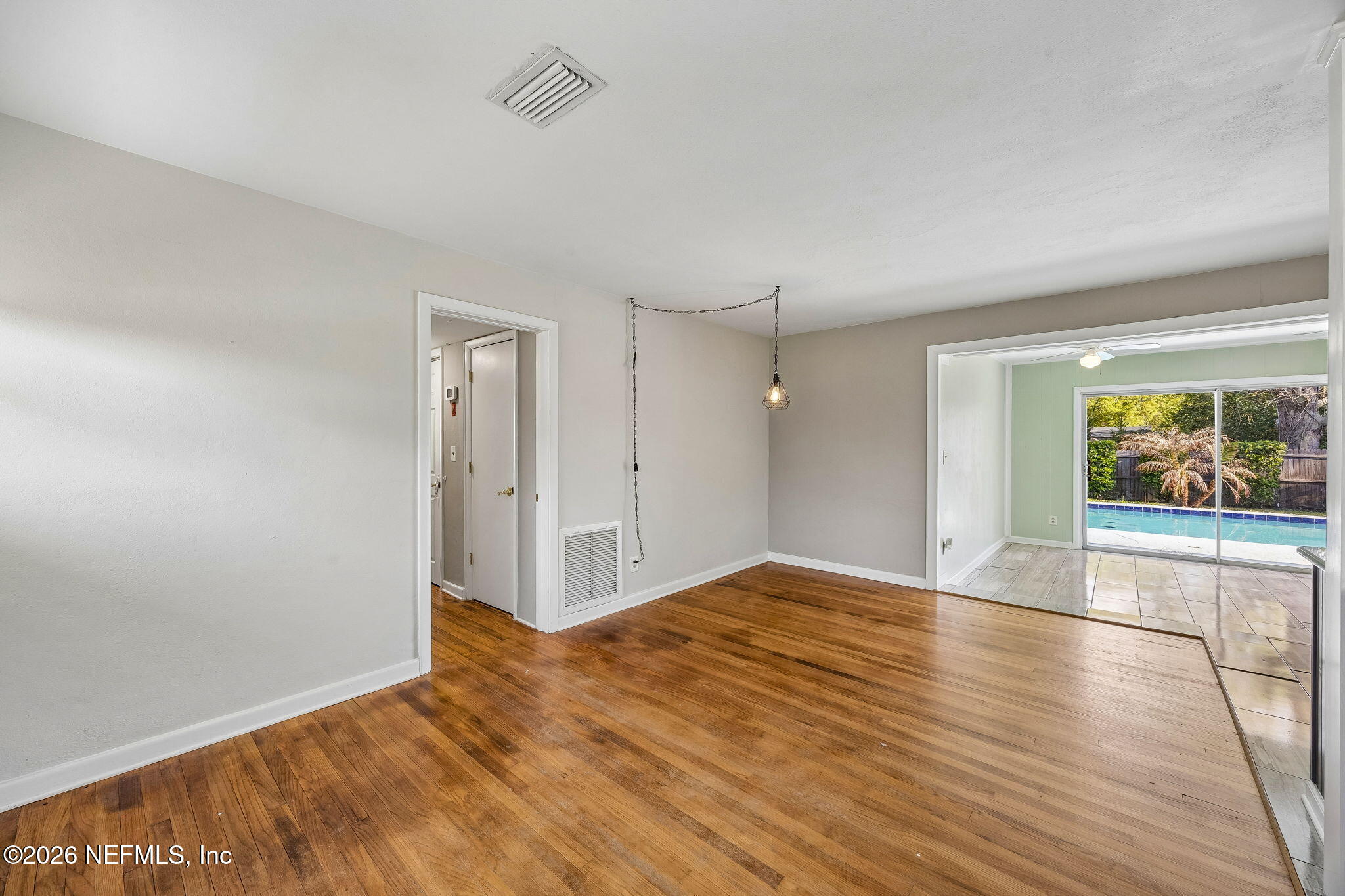 3647 Coronado Road Jacksonville, FL 32217 - Photo 9 of 49 a view of an empty room and window