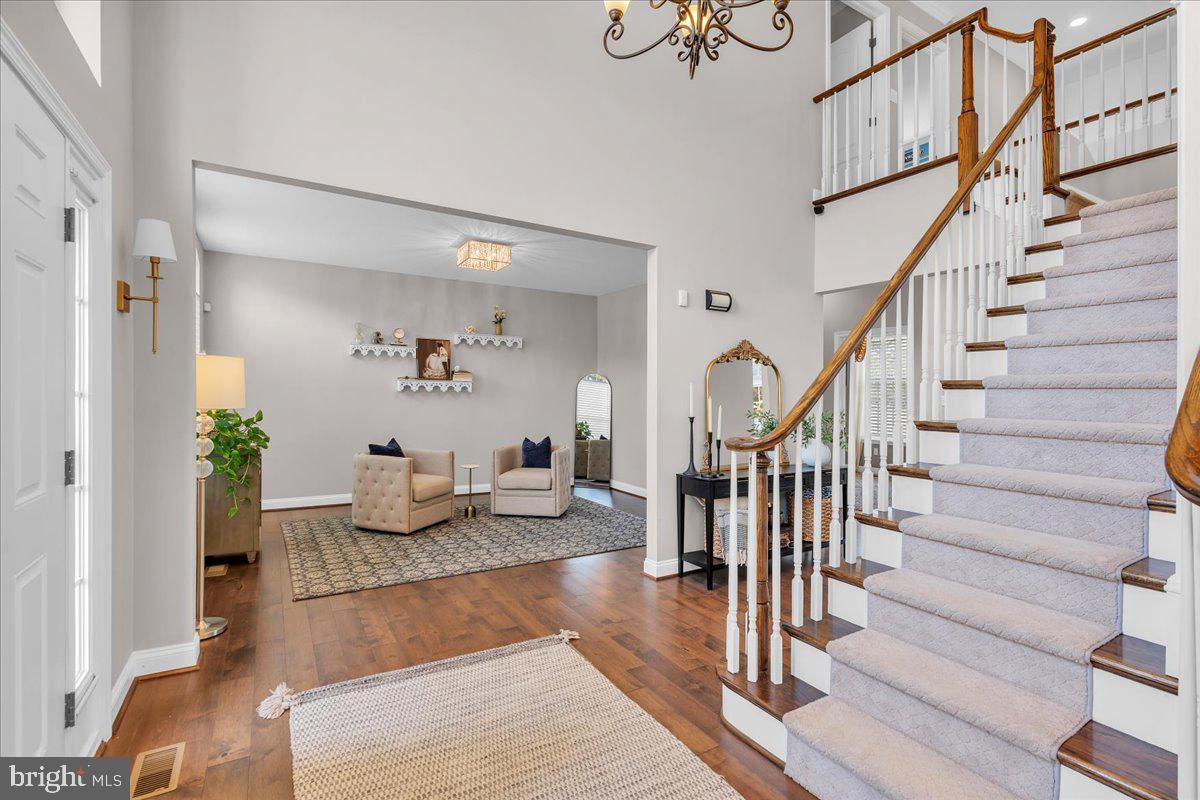 8 Elk Court Sewell, NJ 08080 - Photo 4 of 38 a living room with furniture and wooden floor