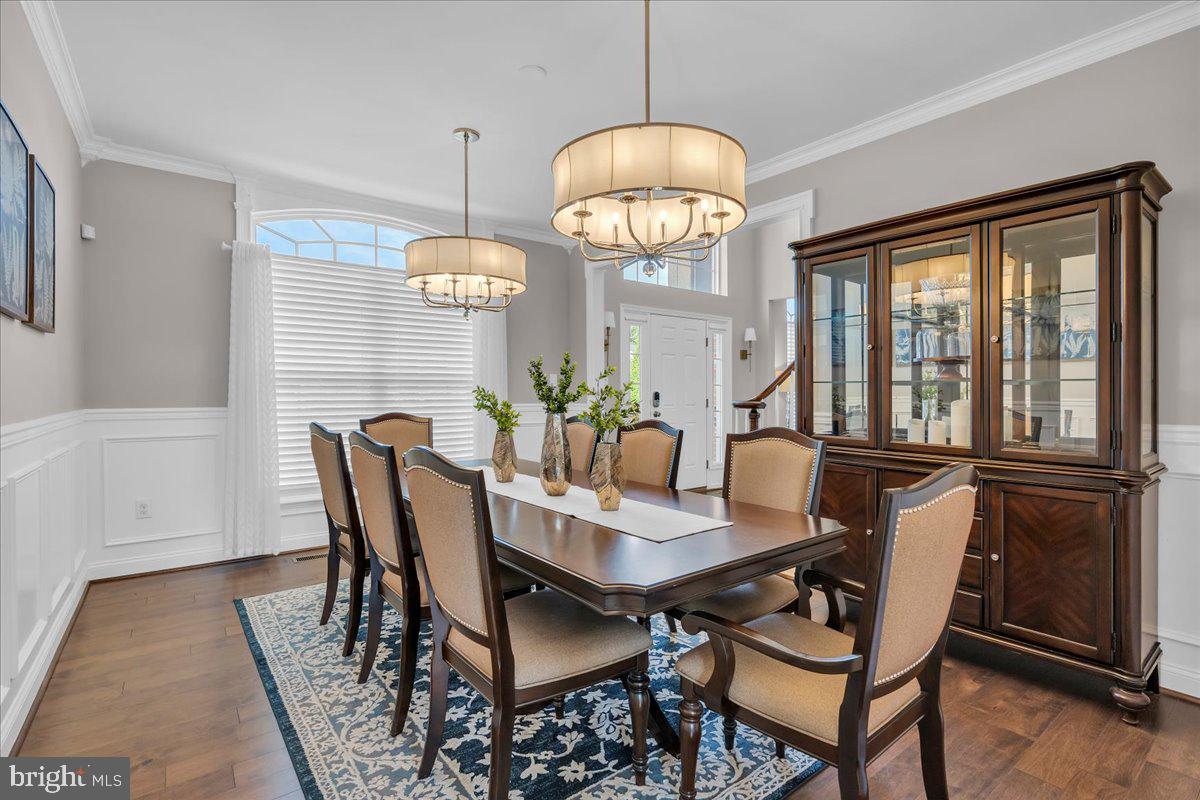 8 Elk Court Sewell, NJ 08080 - Photo 6 of 38 a view of a dining room with furniture window and wooden floor