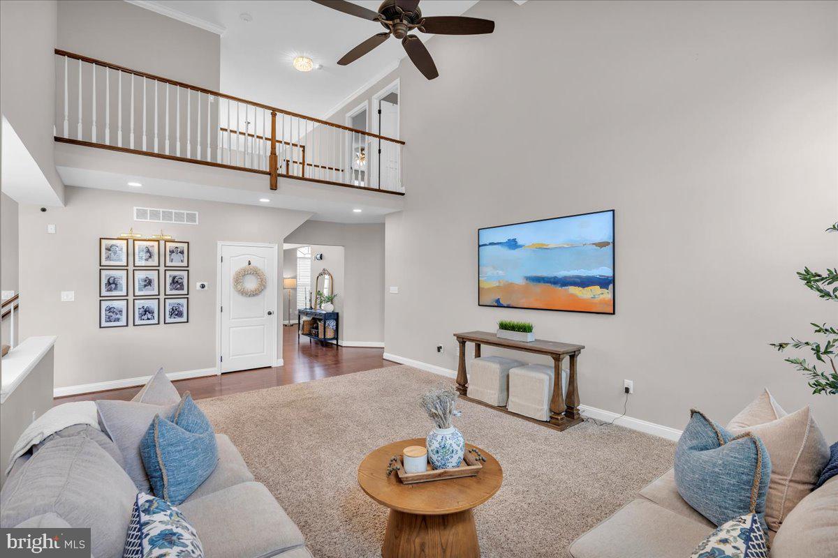 8 Elk Court Sewell, NJ 08080 - Photo 8 of 38 a living room with furniture and a wall painting