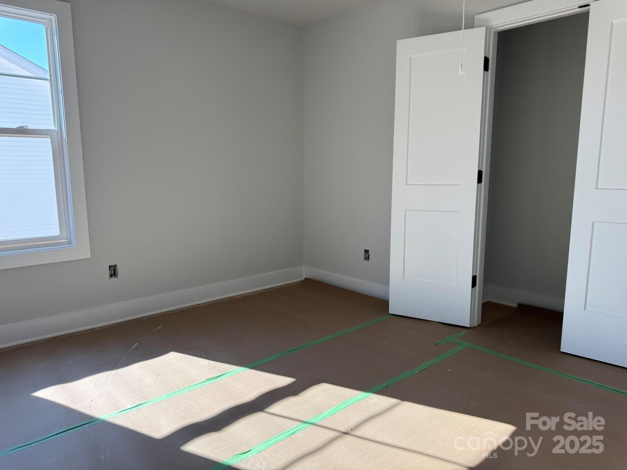 6229 King Wilkinson Road Denver, NC 28037 - Photo 11 of 14 a view of an empty room with a window