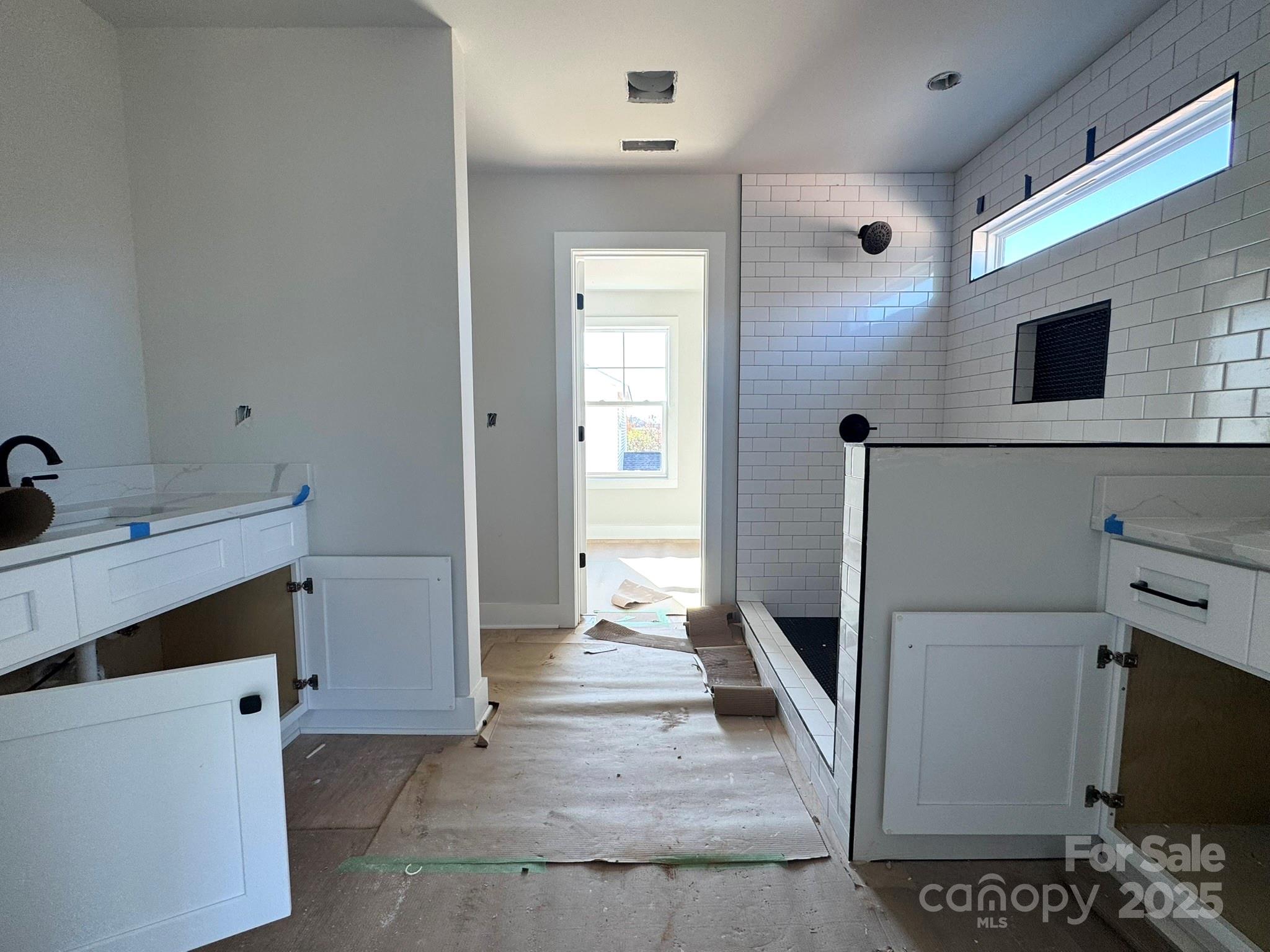 6229 King Wilkinson Road Denver, NC 28037 - Photo 12 of 14 a view of a kitchen from the hallway