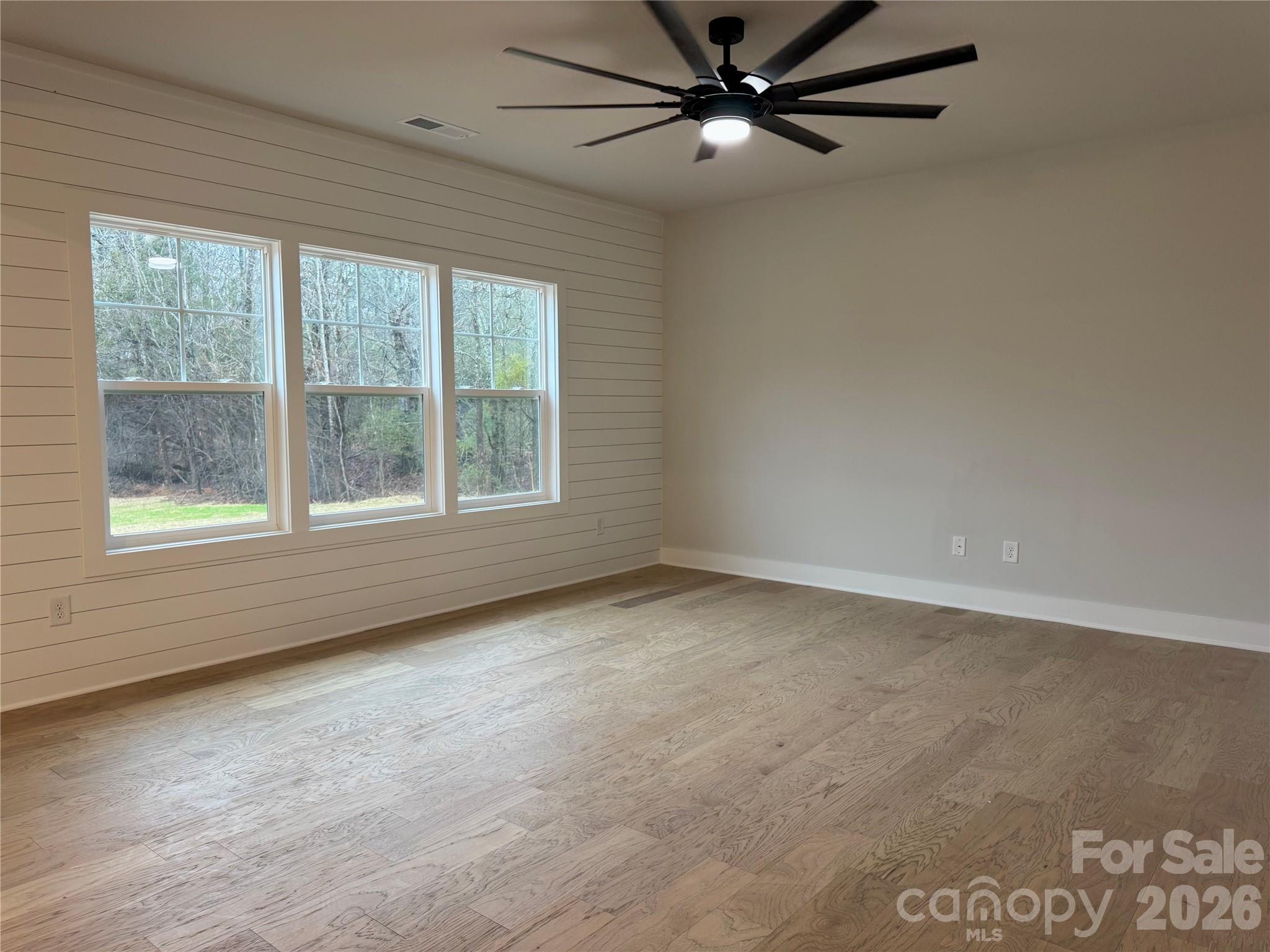 6229 King Wilkinson Road Denver, NC 28037 - Photo 6 of 13 an empty room with a window
