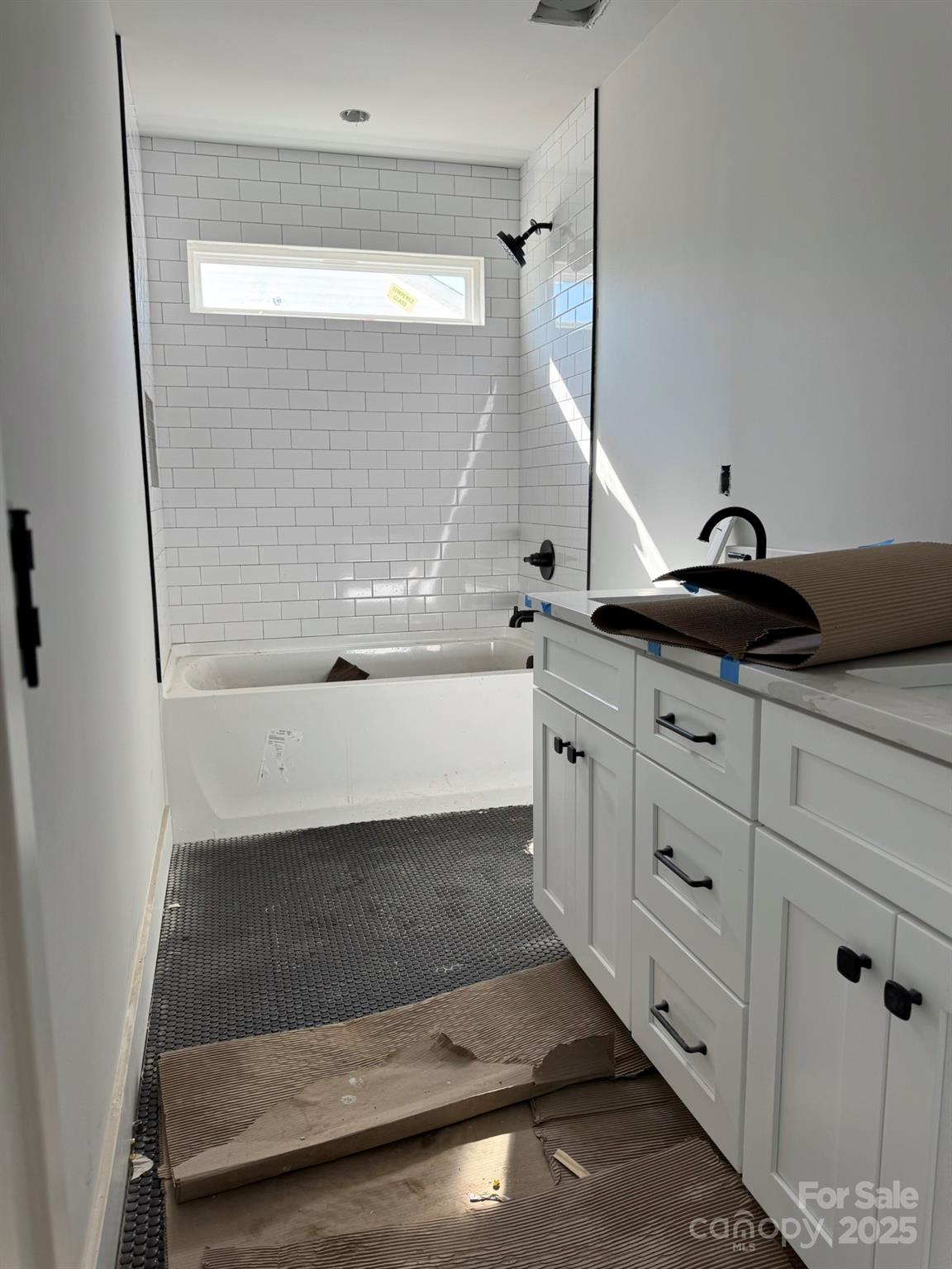 6229 King Wilkinson Road Denver, NC 28037 - Photo 7 of 14 a bathroom with a sink and a mirror