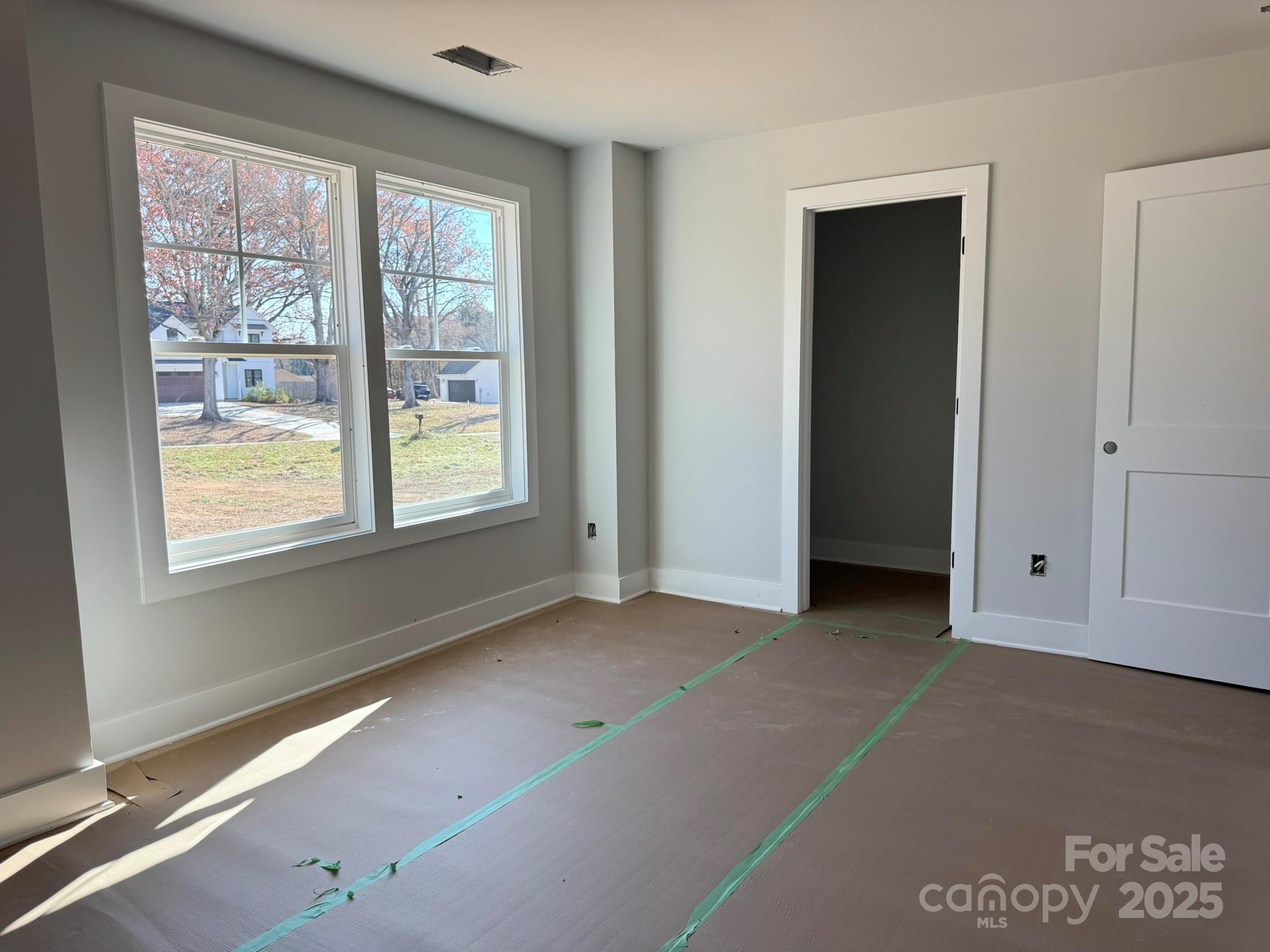 6229 King Wilkinson Road Denver, NC 28037 - Photo 9 of 14 a view of an empty room with a window