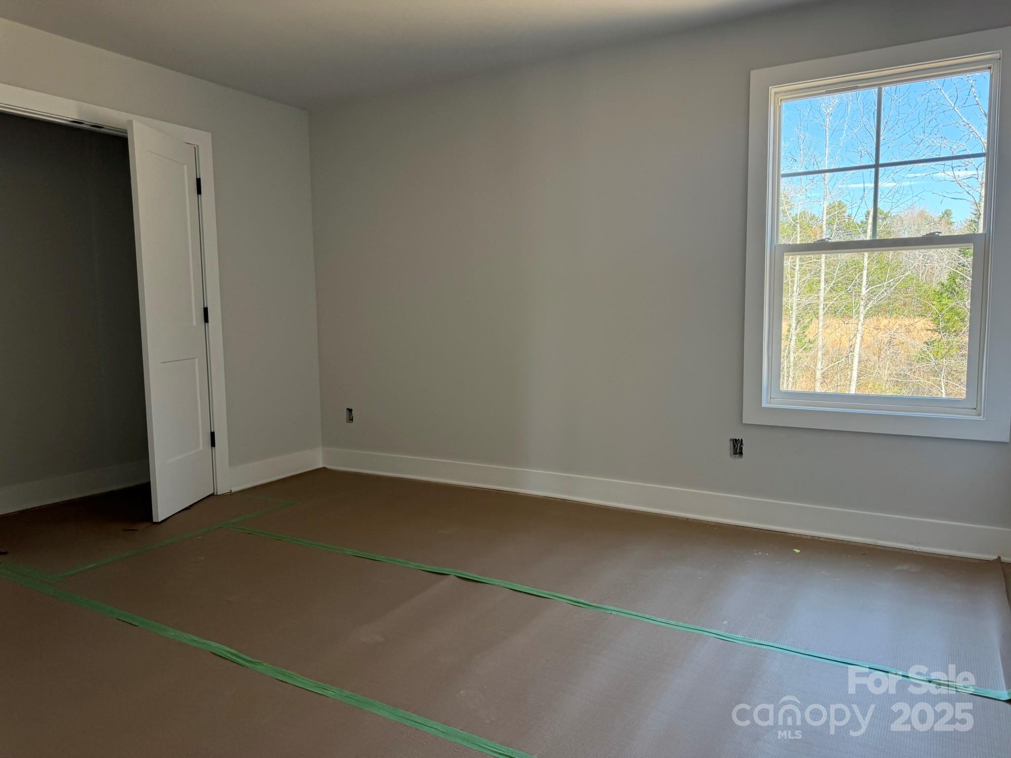 6229 King Wilkinson Road Denver, NC 28037 - Photo 10 of 14 an empty room with a window