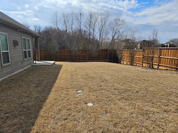 a view of large building with a yard