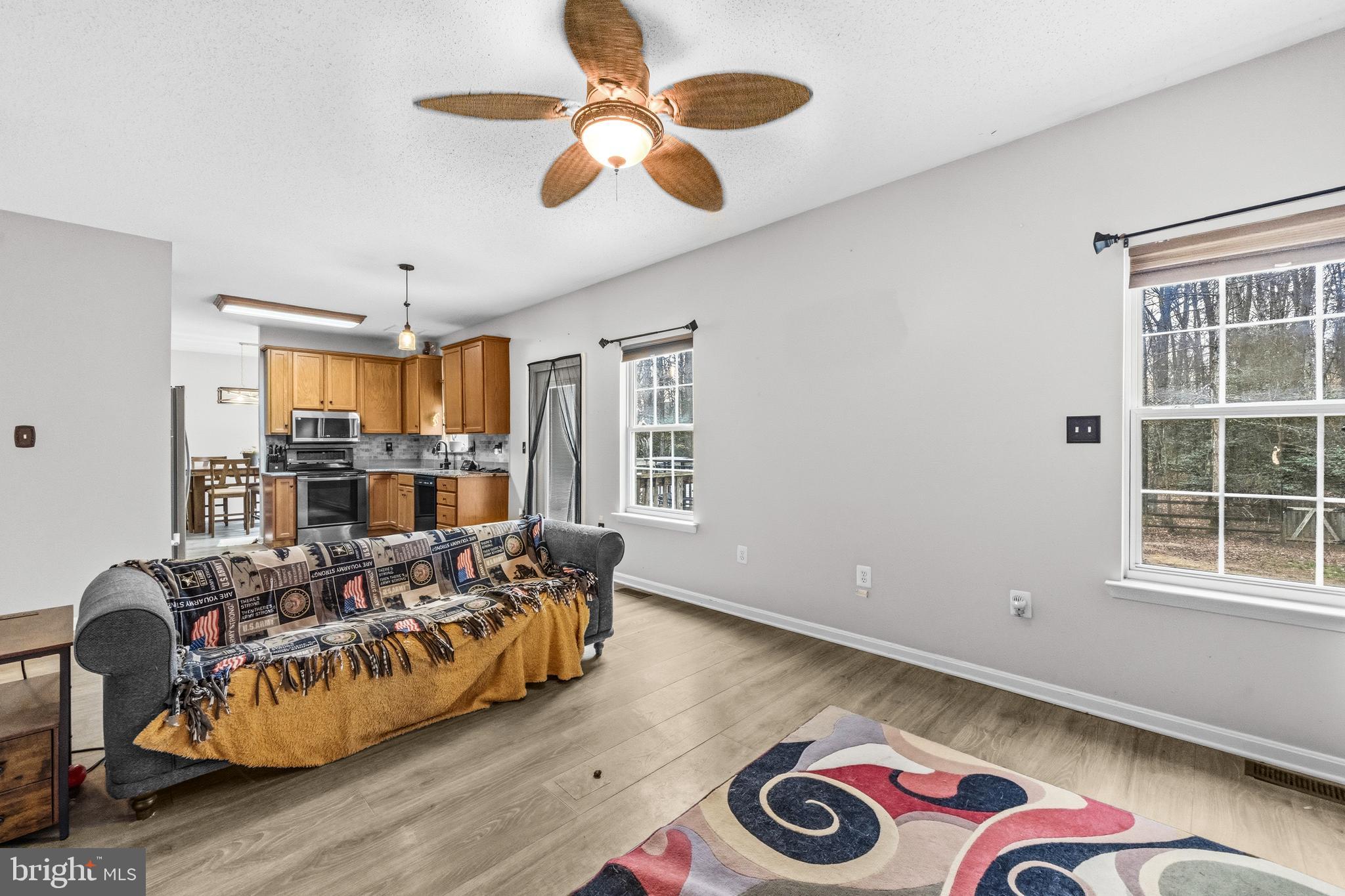 115 Myrtleleaf Circle La Plata, MD 20646 - Photo 12 of 37 a bedroom with furniture and a large window