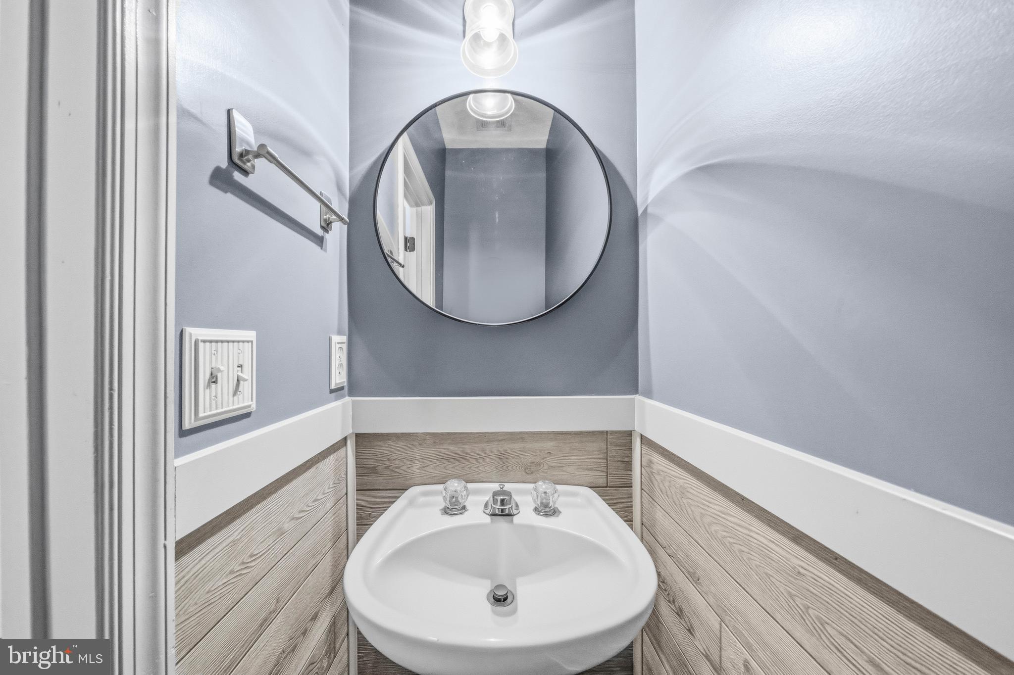 115 Myrtleleaf Circle La Plata, MD 20646 - Photo 15 of 37 a bathroom with a sink and a mirror