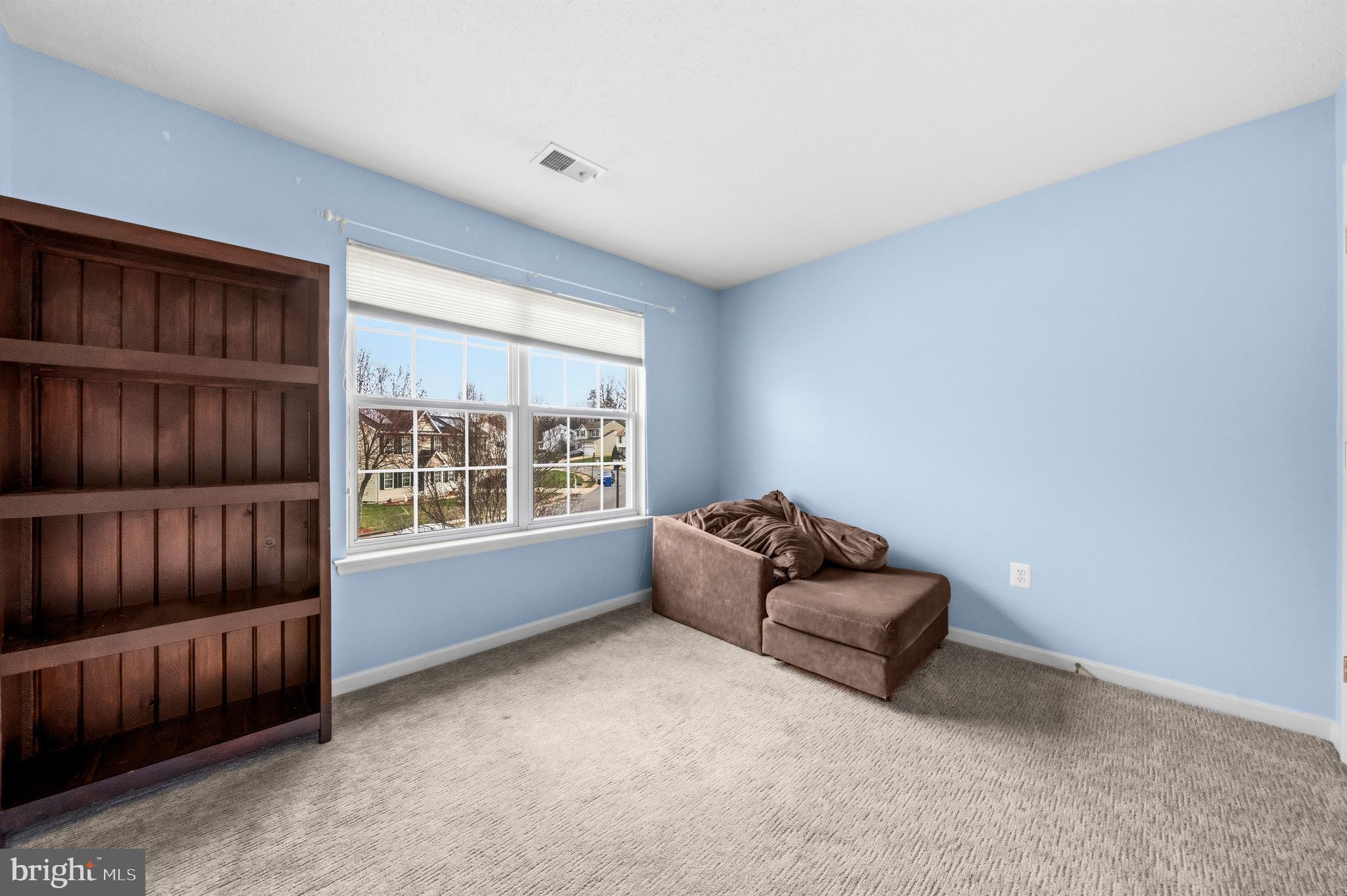 115 Myrtleleaf Circle La Plata, MD 20646 - Photo 16 of 37 a living room with furniture and a window