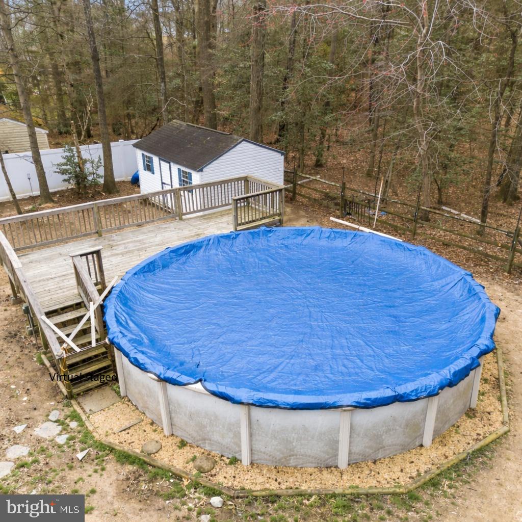 115 Myrtleleaf Circle La Plata, MD 20646 - Photo 34 of 37 a view of a swimming pool with an outdoor space