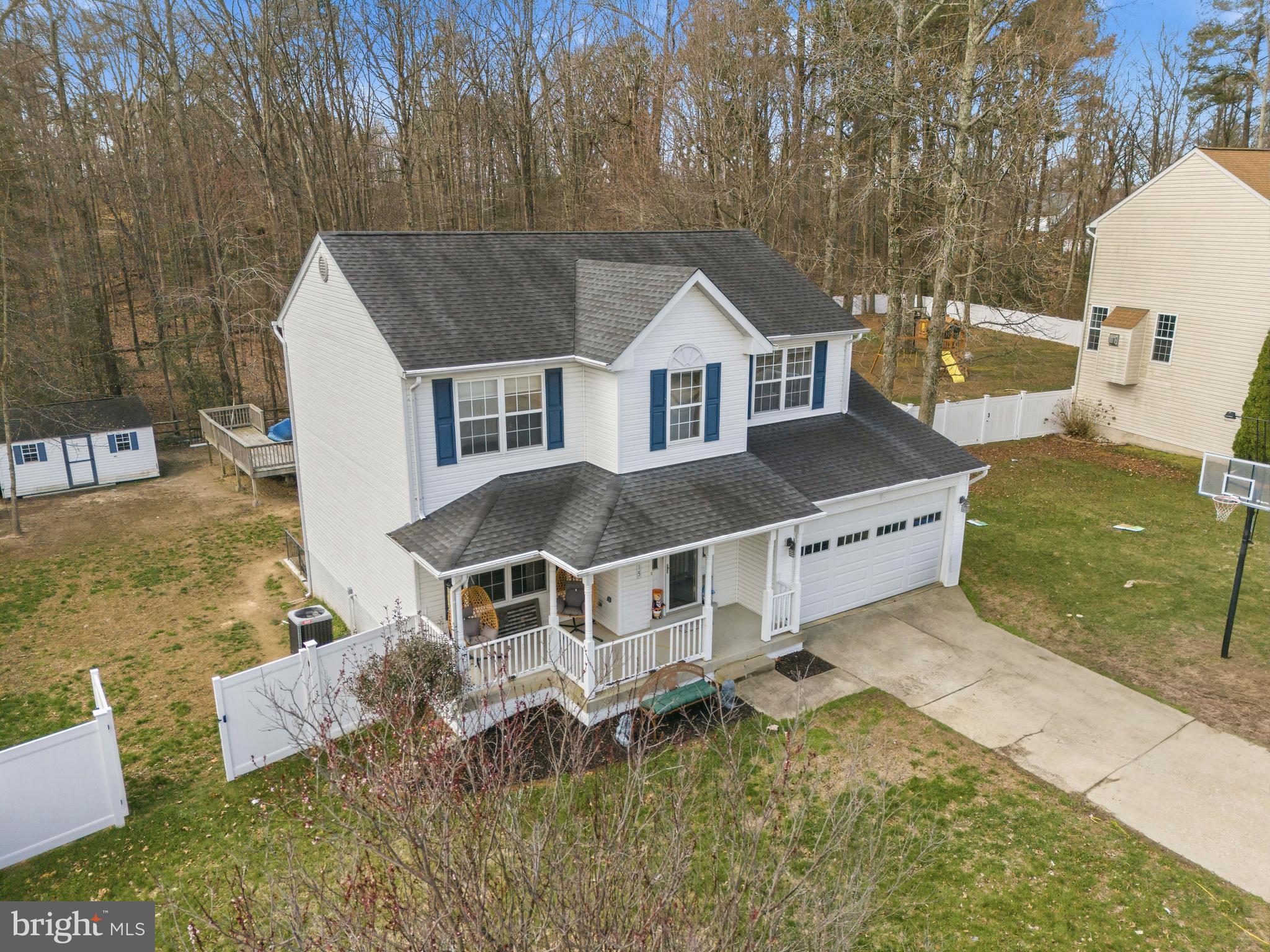 115 Myrtleleaf Circle La Plata, MD 20646 - Photo 5 of 37 an aerial view of a house with a yard