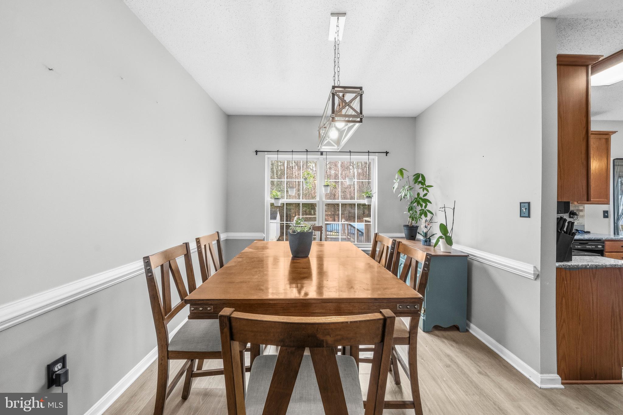 115 Myrtleleaf Circle La Plata, MD 20646 - Photo 10 of 37 a view of a dining room with furniture window and wooden floor