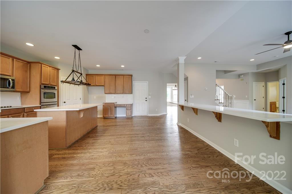 2751 Rivendale Court Indian Land, SC 29707 - Photo 24 of 48 a large kitchen with kitchen island a sink stainless steel appliances and cabinets