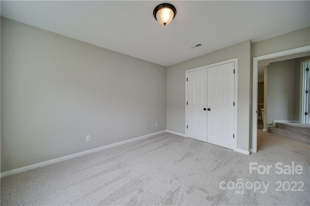 2751 Rivendale Court Indian Land, SC 29707 - Photo 37 of 48 an empty room with closet area