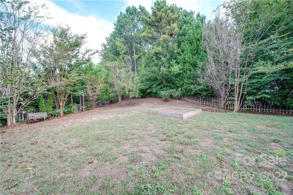 2751 Rivendale Court Indian Land, SC 29707 - Photo 43 of 48 a view of a field with trees in the background