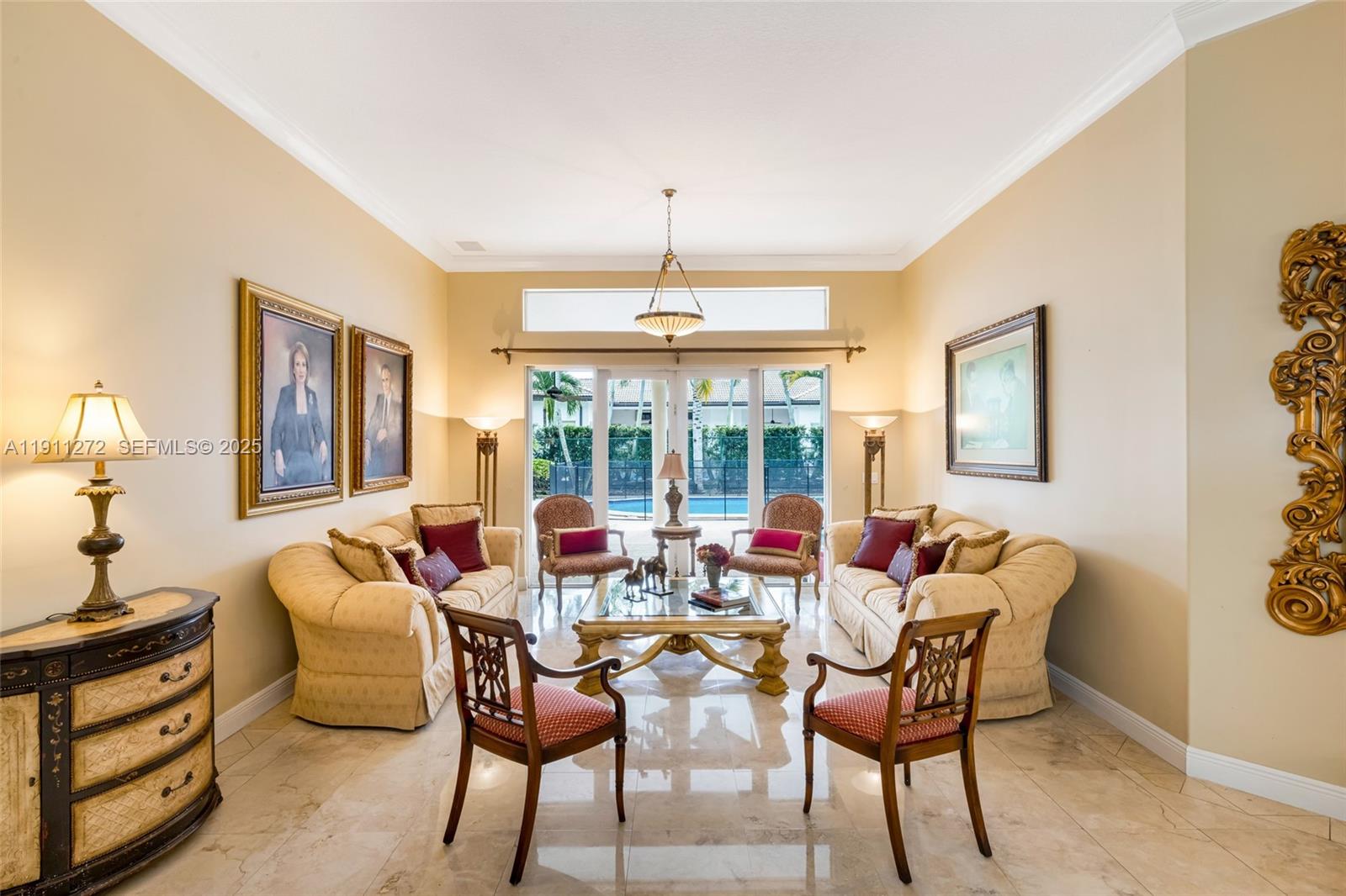 7250 Southwest 99th Street Pinecrest, FL 33156 - Photo 11 of 40 a dining room with furniture and window