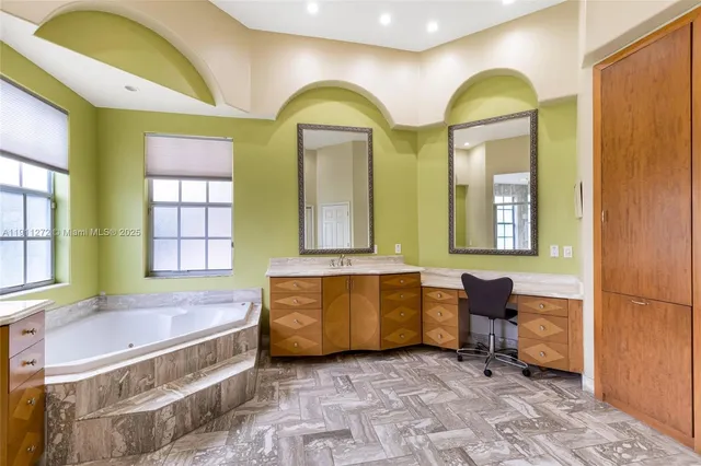 a view of a swimming pool with a patio